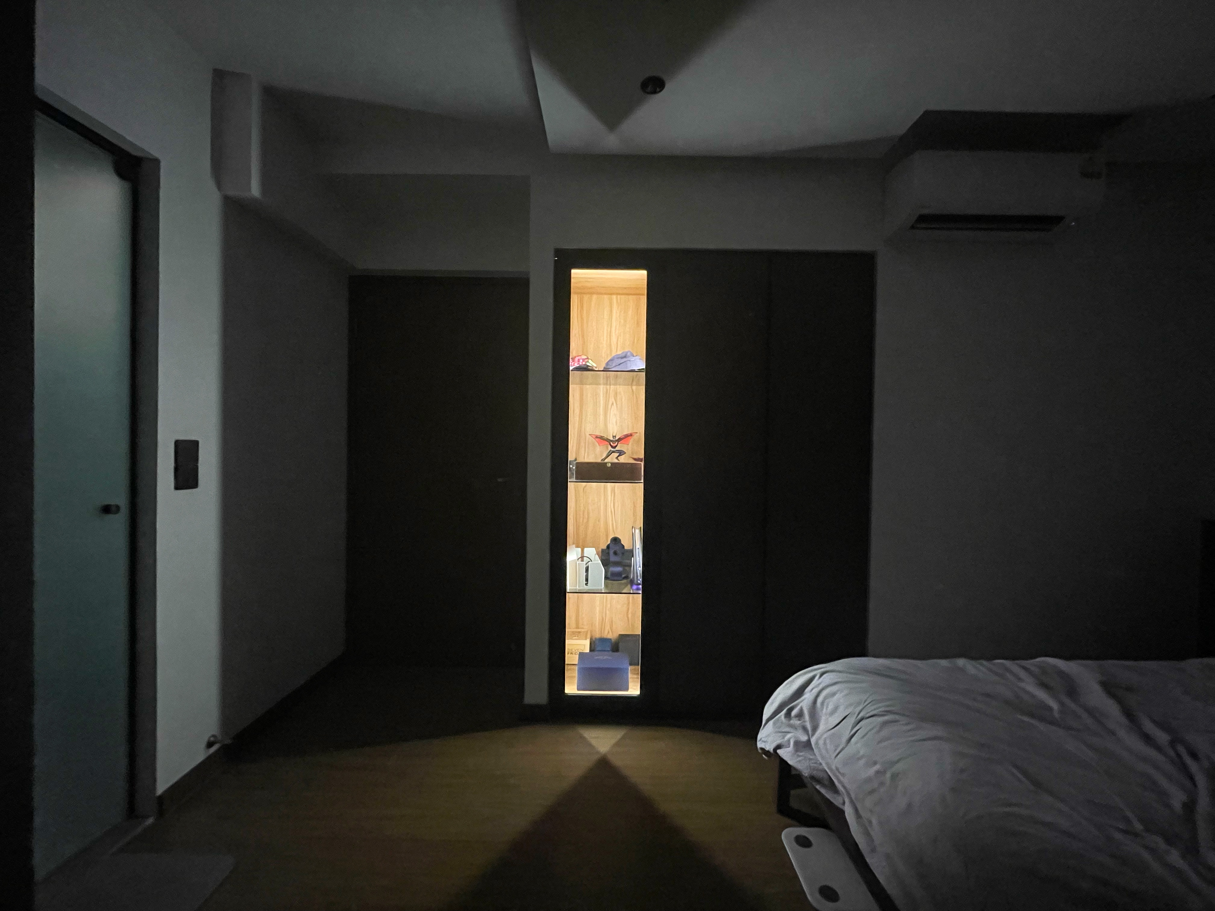 This is where the fun choice starts - dimly lit room, cozy bedroom, modern decor, wooden shelves, soft lighting, dark
