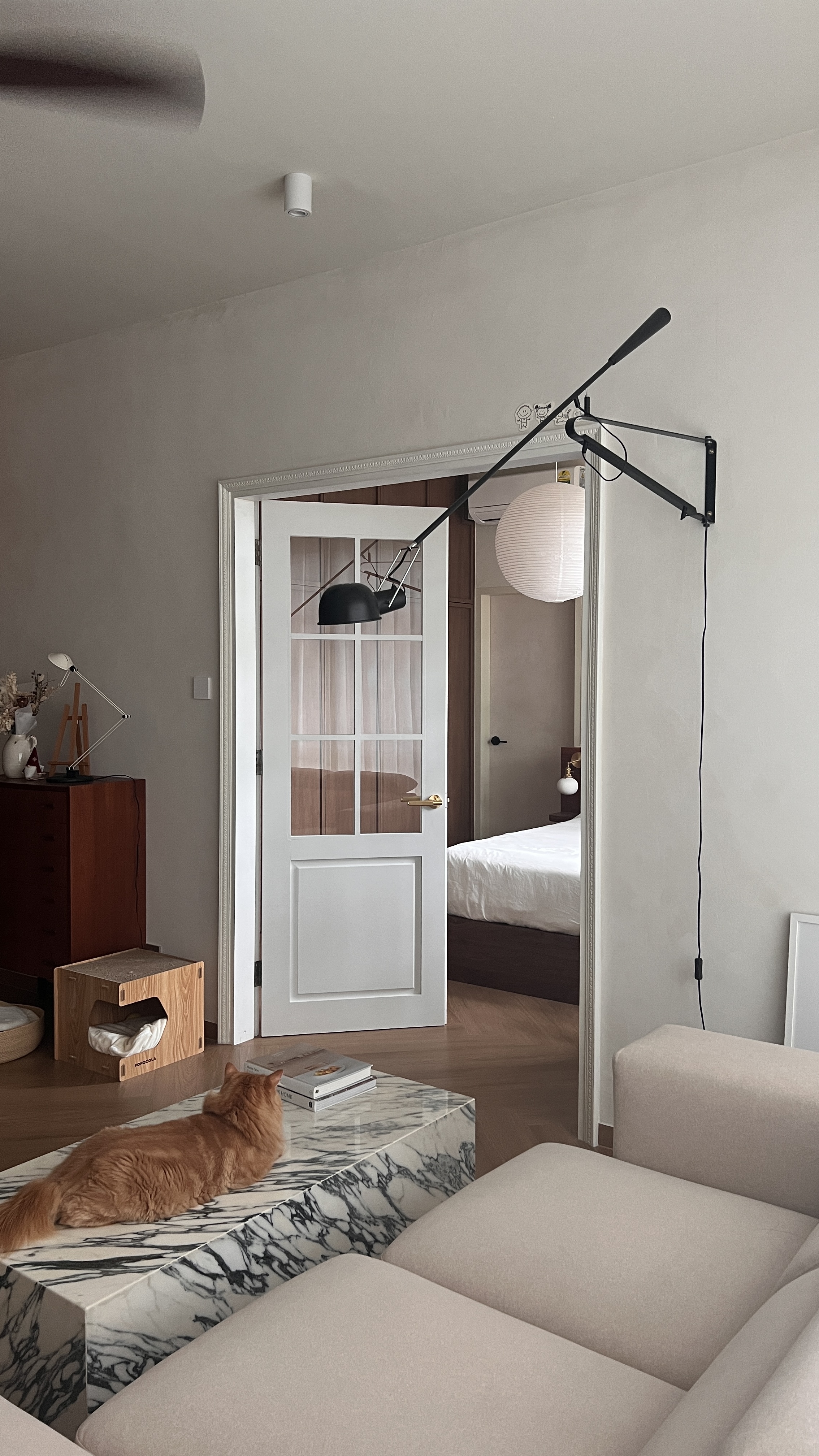 An Unconventional Design & Layout Home.  - modern living room, cozy bedroom, minimalist decor, neutral color palette, wooden