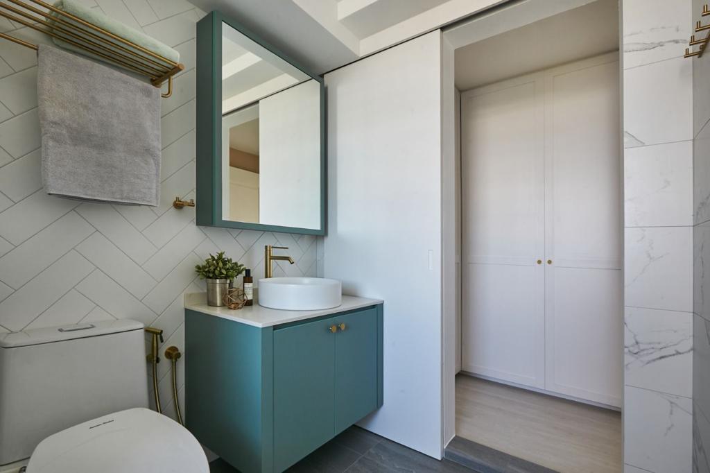 Welcome to our Open Concept Kids Friendly Home  - White tiled wall, gold fixtures, teal cabinet, modern sink, minimalist