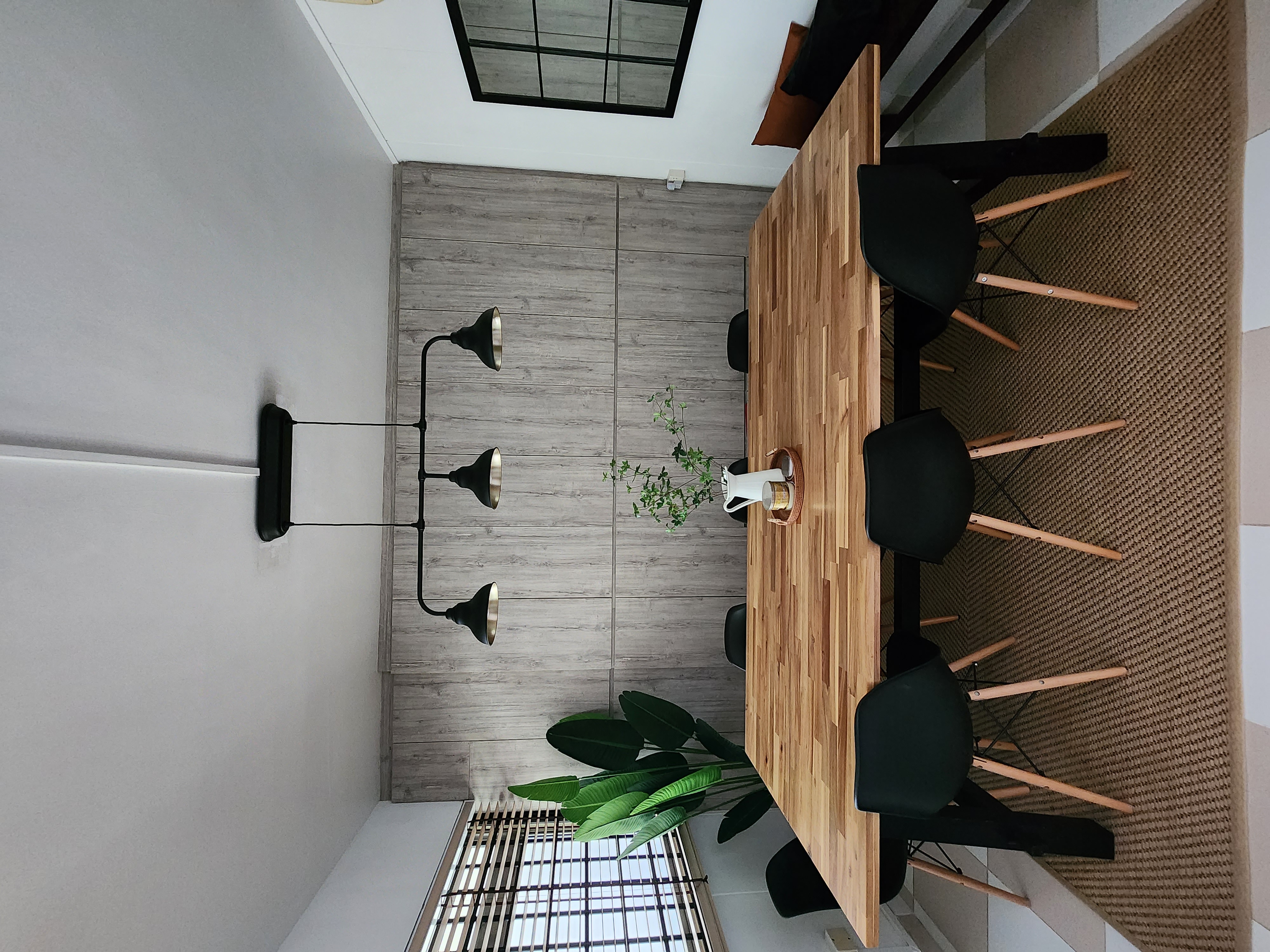 Modern Rustic with a touch of Scandinavian - Wooden dining table, black chairs, modern decor, minimalist design, natural