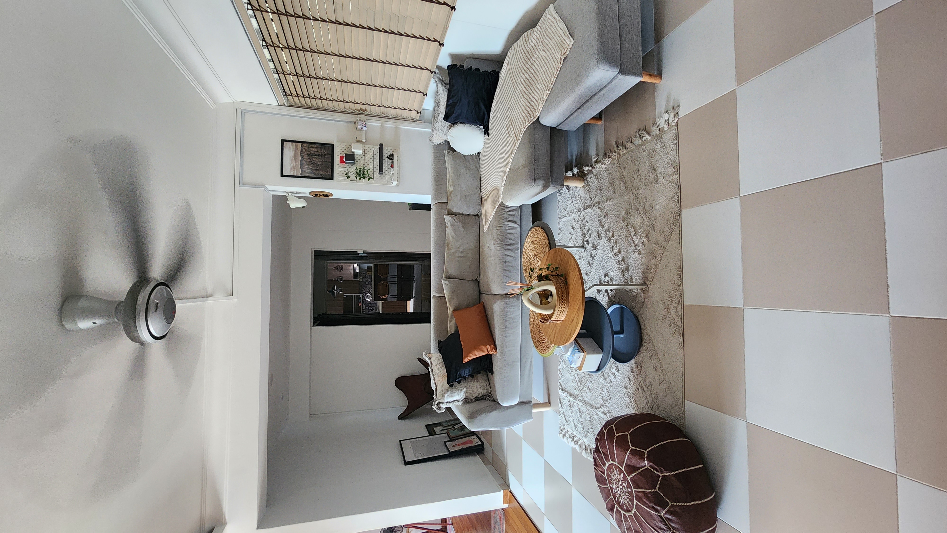 Modern Rustic with a touch of Scandinavian - modern living room, cozy seating, gray sofa, beige rug, wooden coffee table