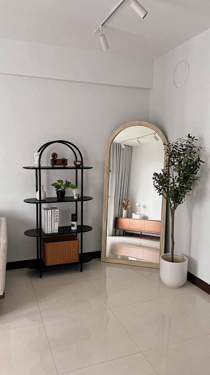 Mid-modern century with hand-me-down built-ins - modern living room, minimalist decor, black metal shelf, white books