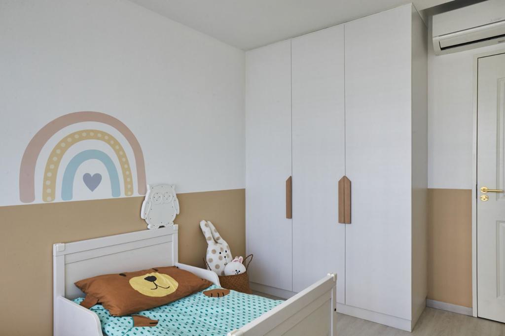 Welcome to our Open Concept Kids Friendly Home  - Children's bedroom with white wardrobes, beige and brown walls, rainbow