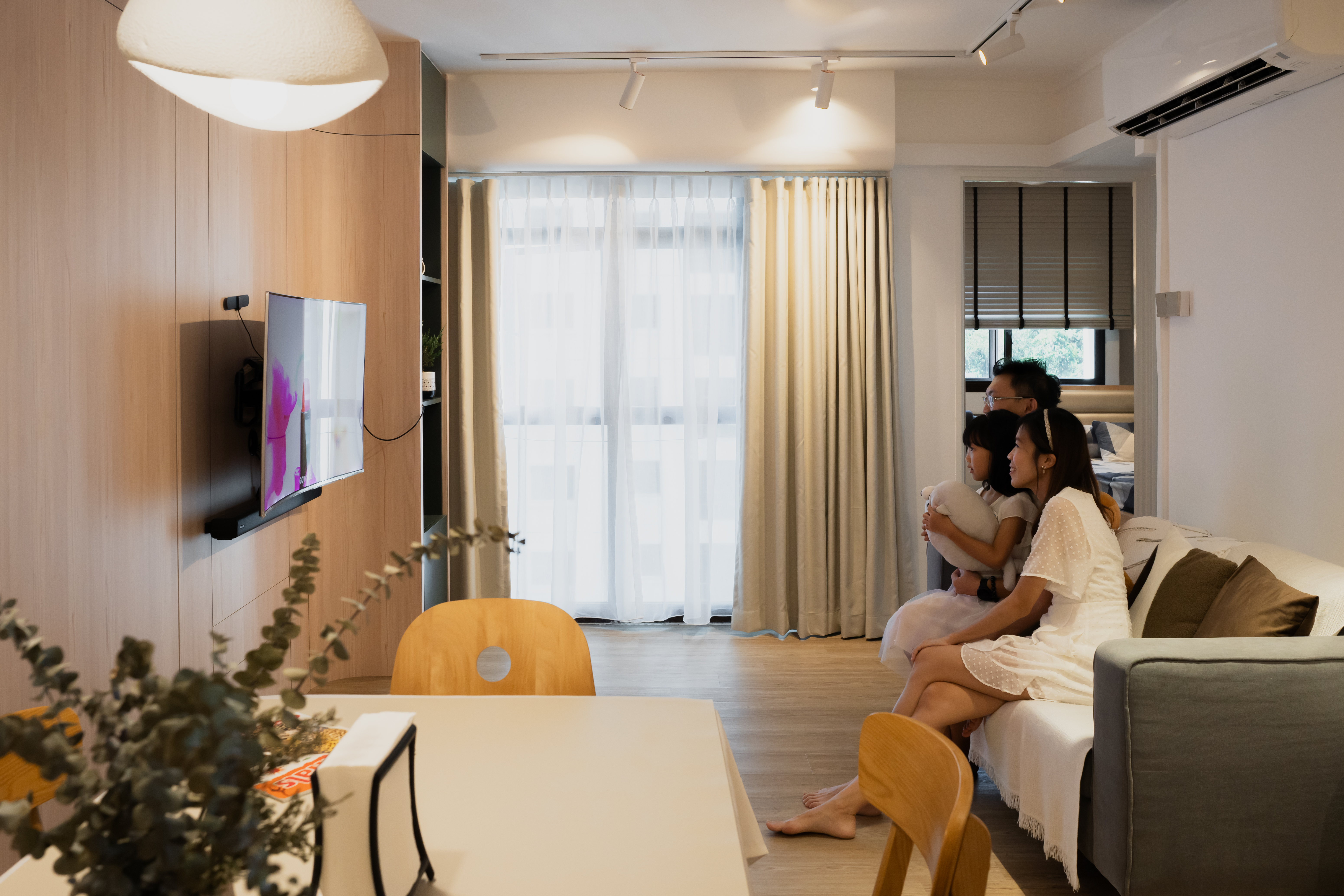 Living Room with graceful curves  - Modern living room, cozy atmosphere, large window, curtains, natural light, wooden wall