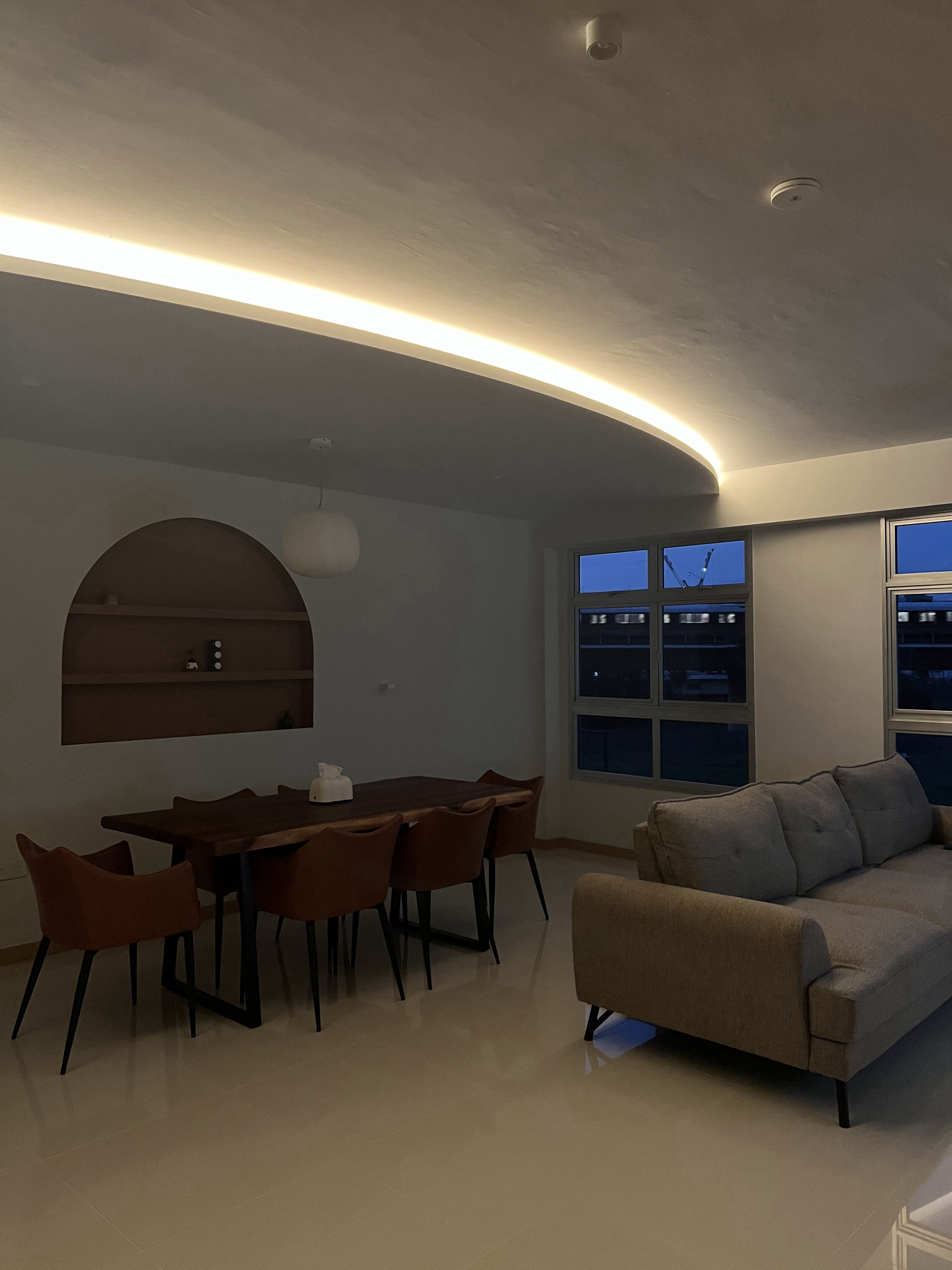 From Blank Canvas to Cosy Haven - Modern dining room with sleek design, minimalist furniture, dining table and chairs, arched