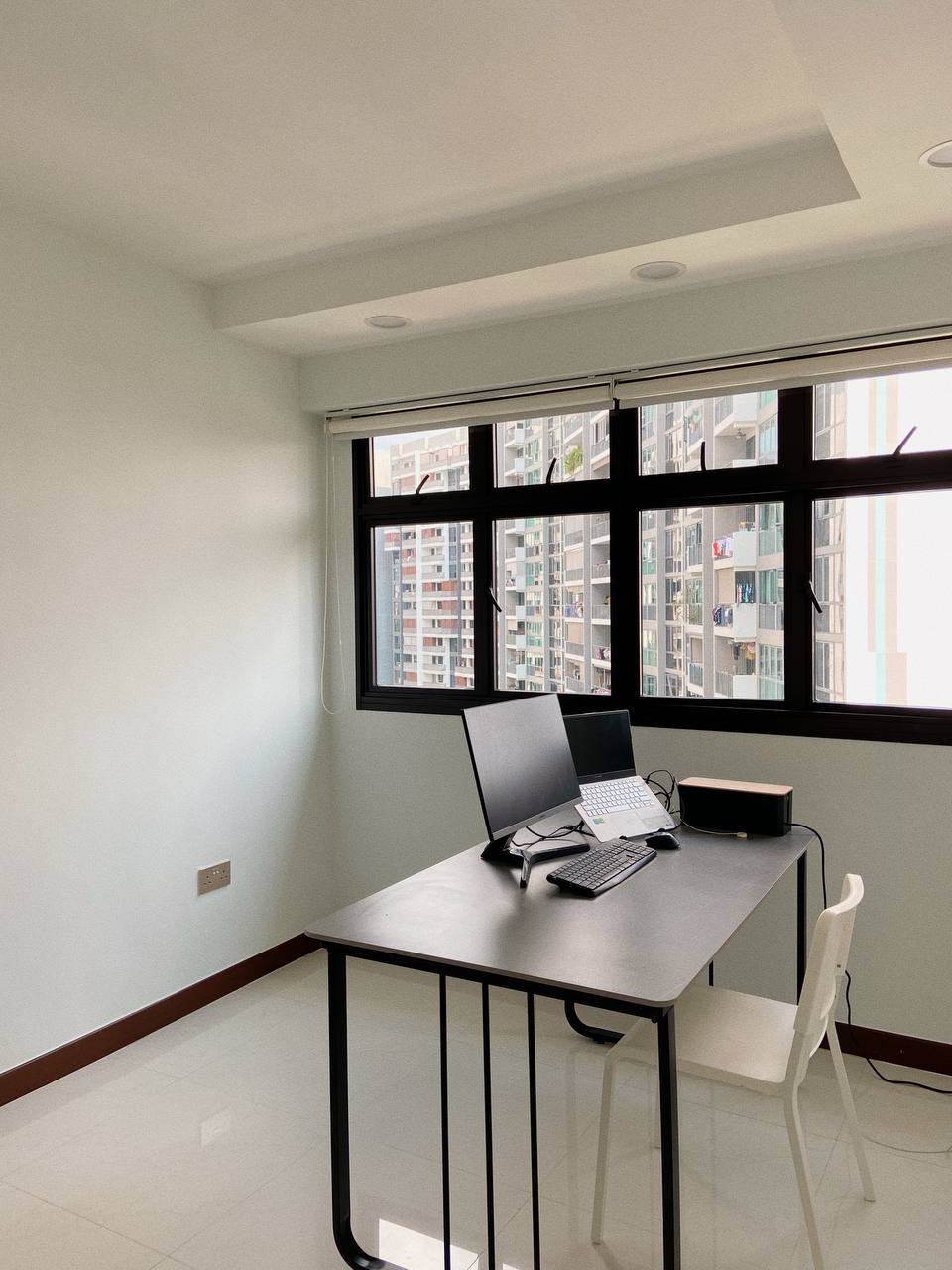 Mid-modern century with hand-me-down built-ins - Modern workspace, minimalist design, open-plan office, sleek desk, dual