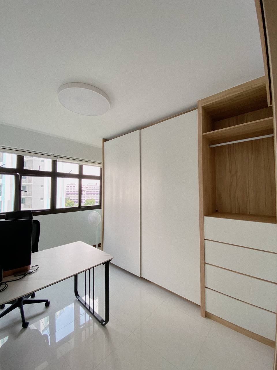 Mid-modern century with hand-me-down built-ins - Modern minimalist office space, sleek white desk, built-in wardrobe, large