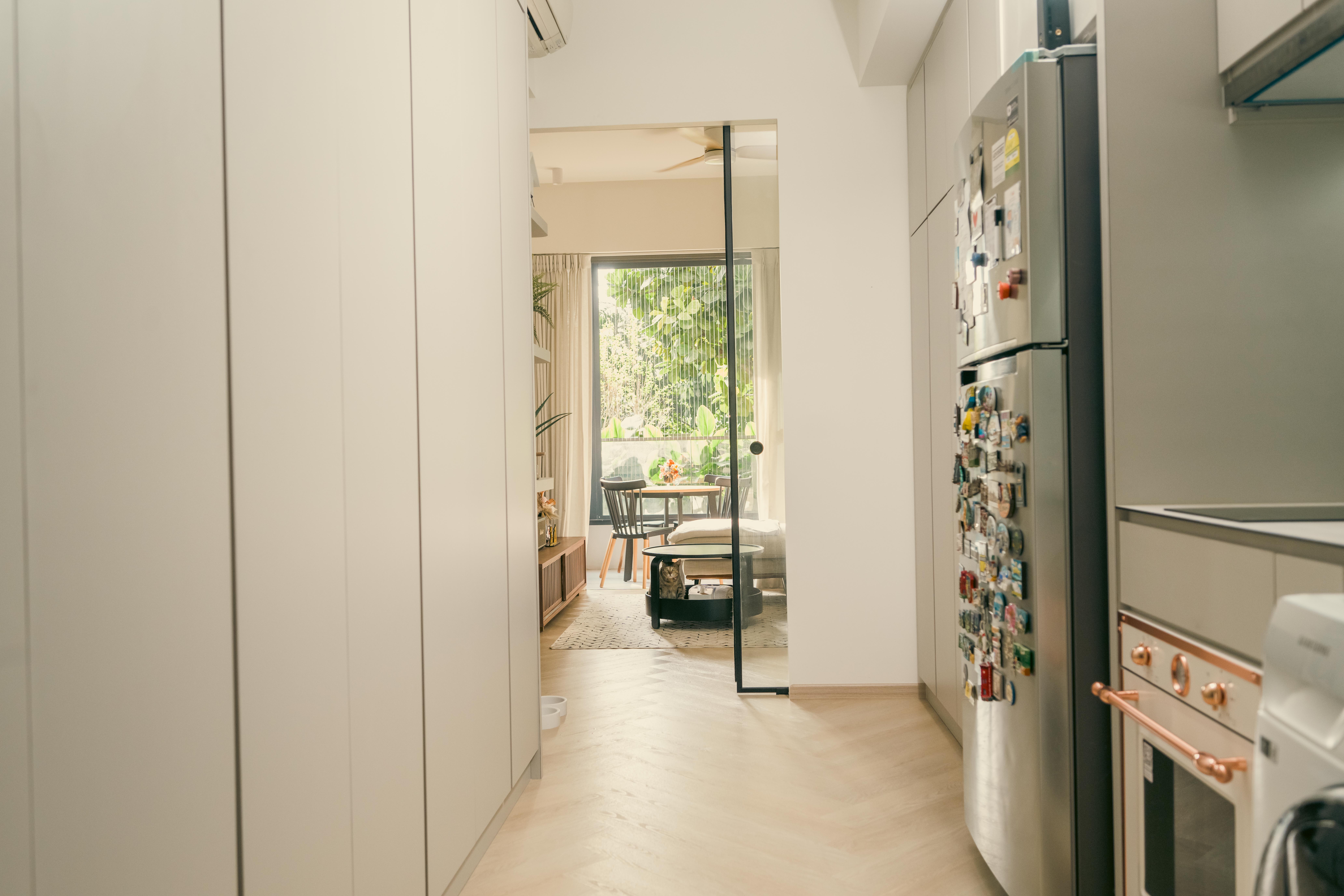 #RUMAHTHEABDULS&#x27; Second Home In The Heart Of Tampines - Modern kitchen with stainless steel refrigerator, white cabinets