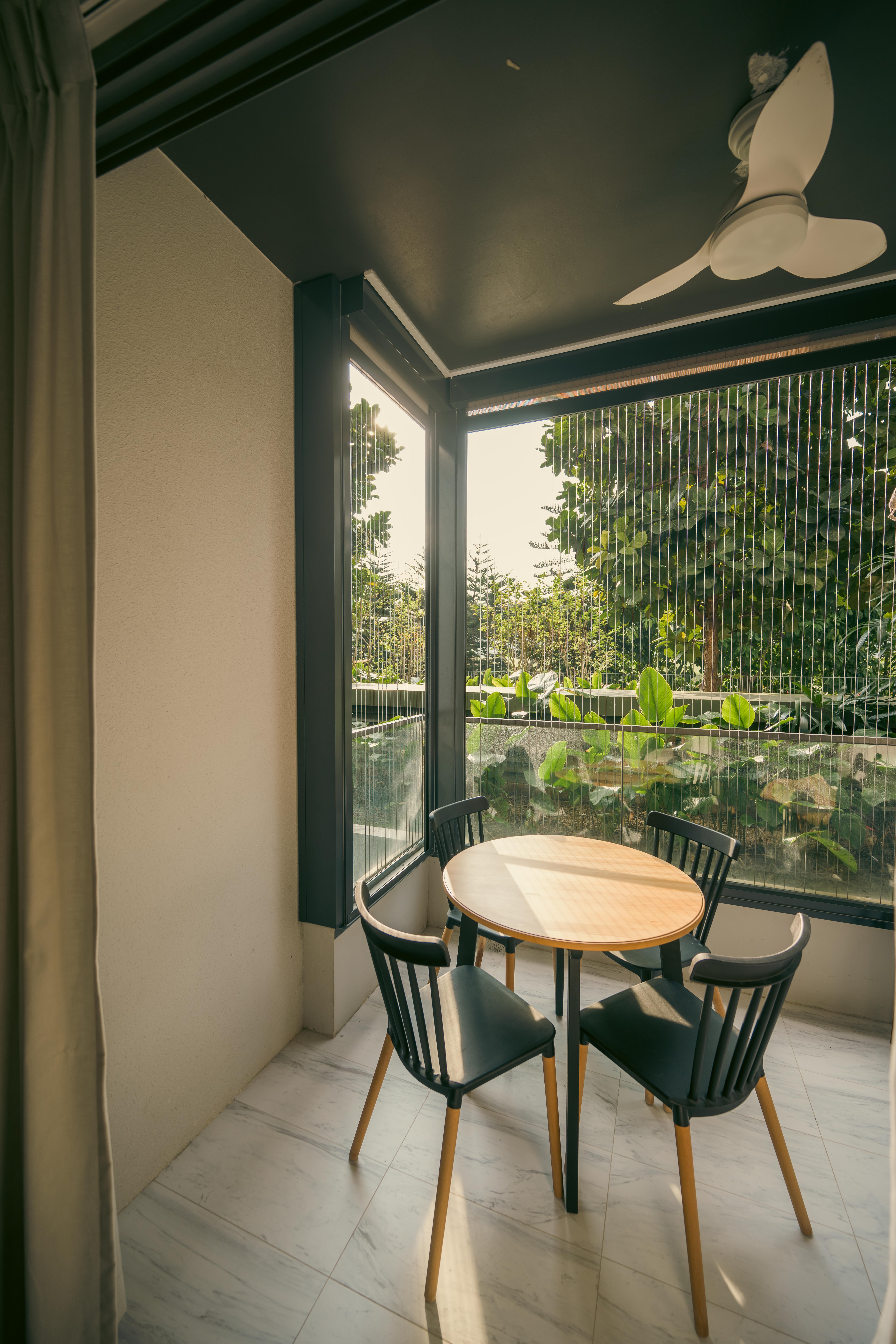 #RUMAHTHEABDULS&#x27; Second Home In The Heart Of Tampines - Modern dining room with wooden table and chairs, large window with