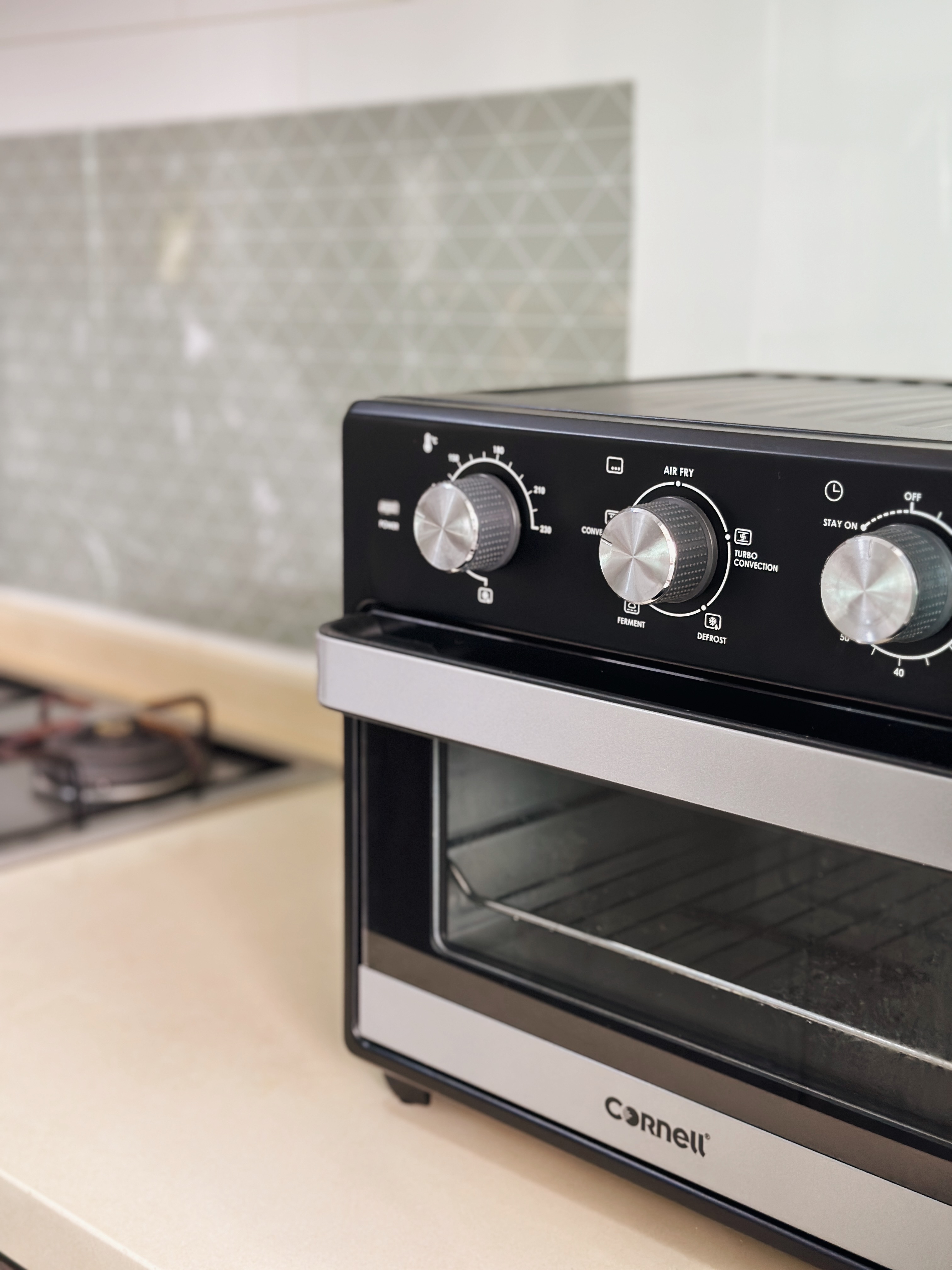 Our Most Used Home Appliance: Air Fryer Oven For Less than $200! - Carnell, modern oven, control knobs, air fryer, defrost