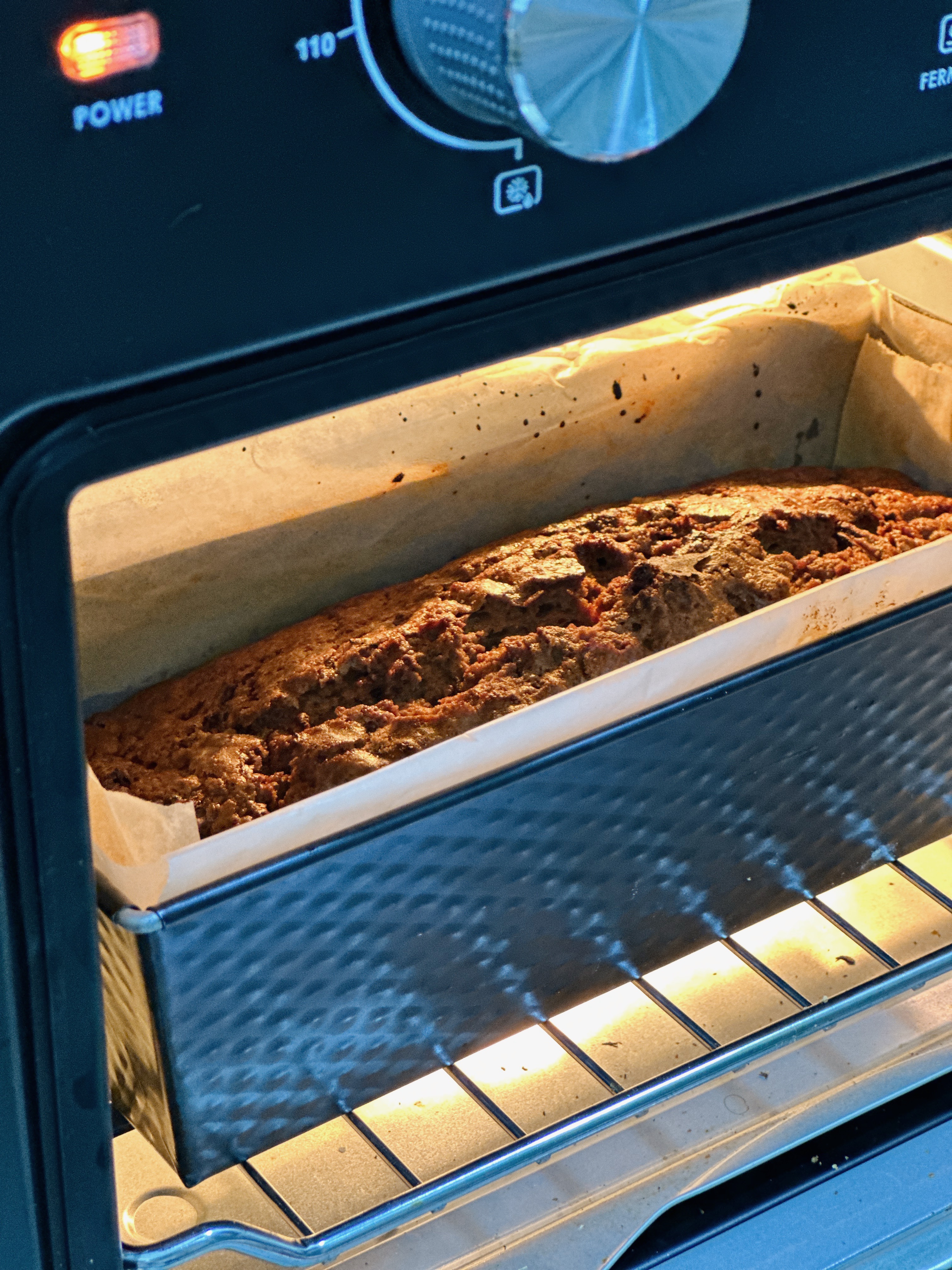 Our Most Used Home Appliance: Air Fryer Oven For Less than $200! - oven, baking tray, loaf of bread, oven rack, power button