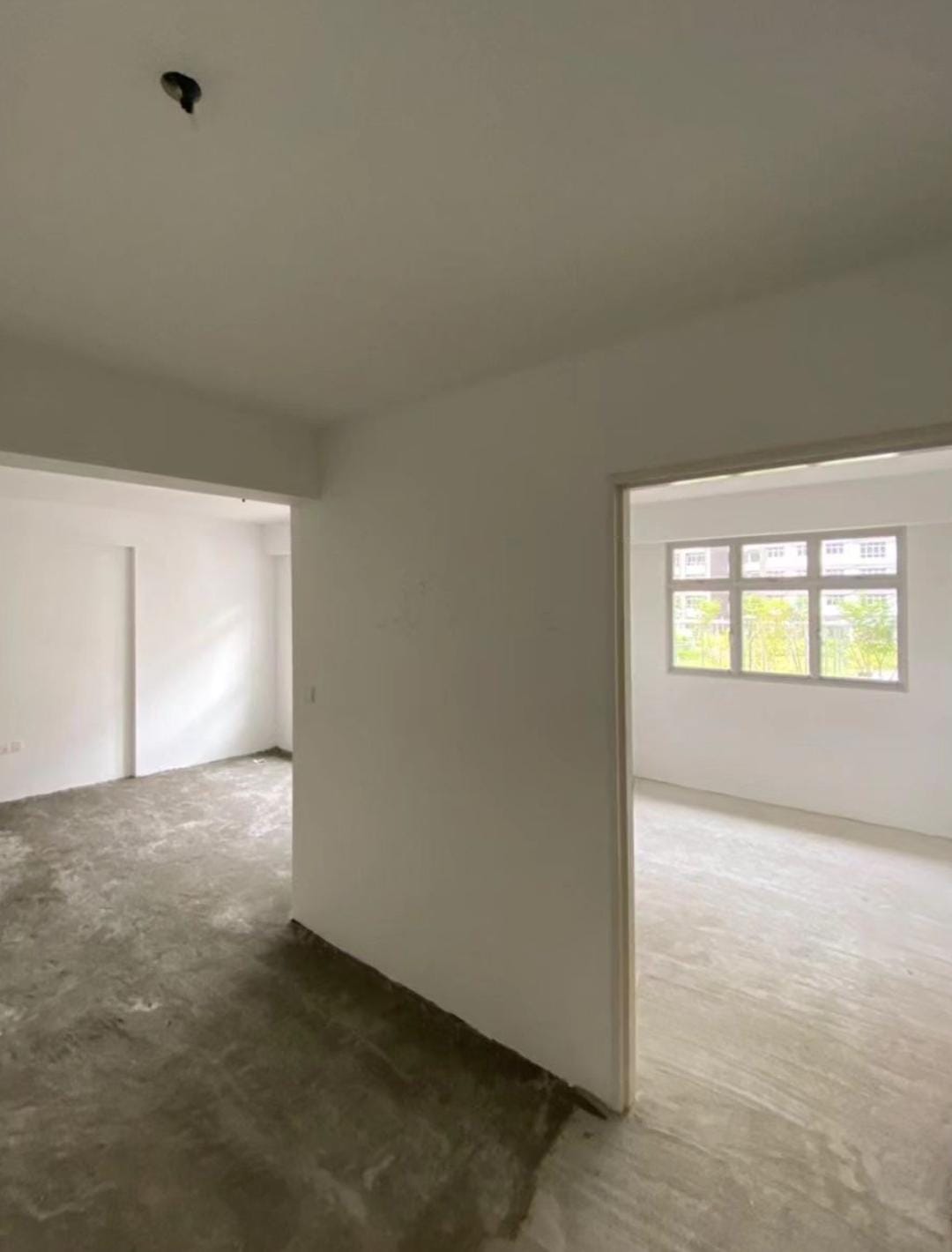 PunggoHField's white minimalist home at $25k - White room, unfinished walls, concrete floor, large windows, natural light