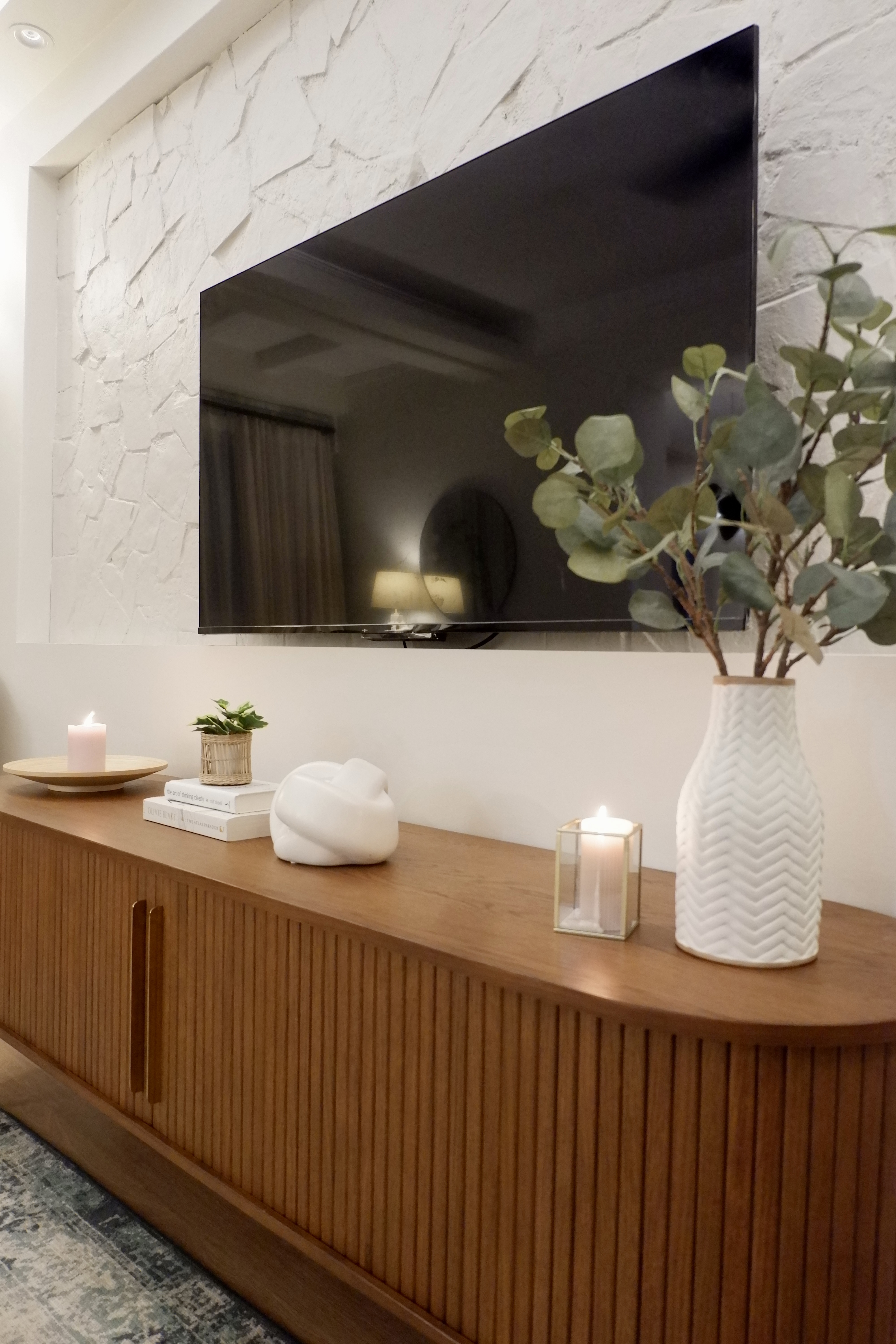 Upgrade outdated wall  - modern living room, minimalist decor, wooden console, textured white wall, sleek black TV