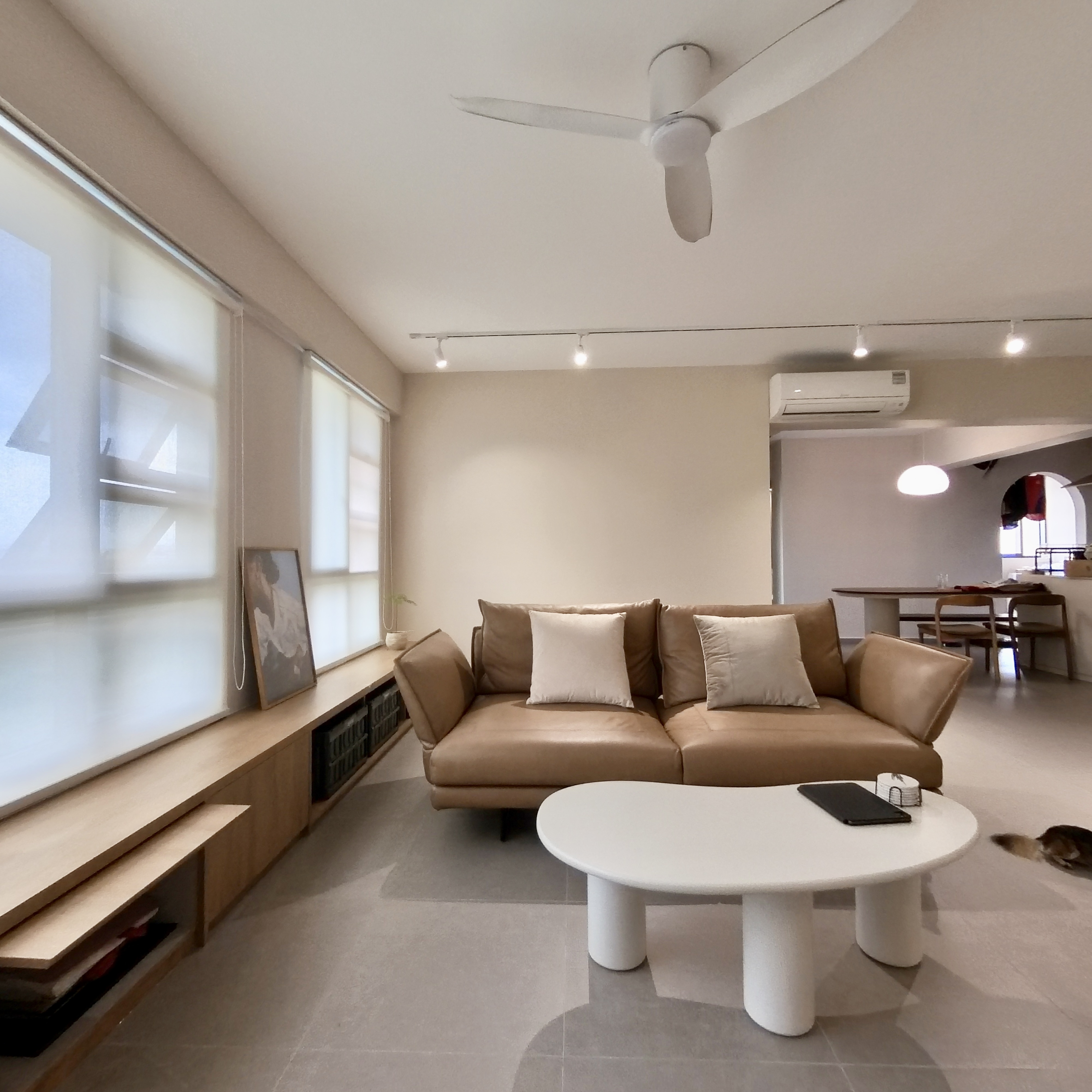 Come take a walk through our minimalist home - Modern minimalist living room, beige sectional sofa, white coffee table, large