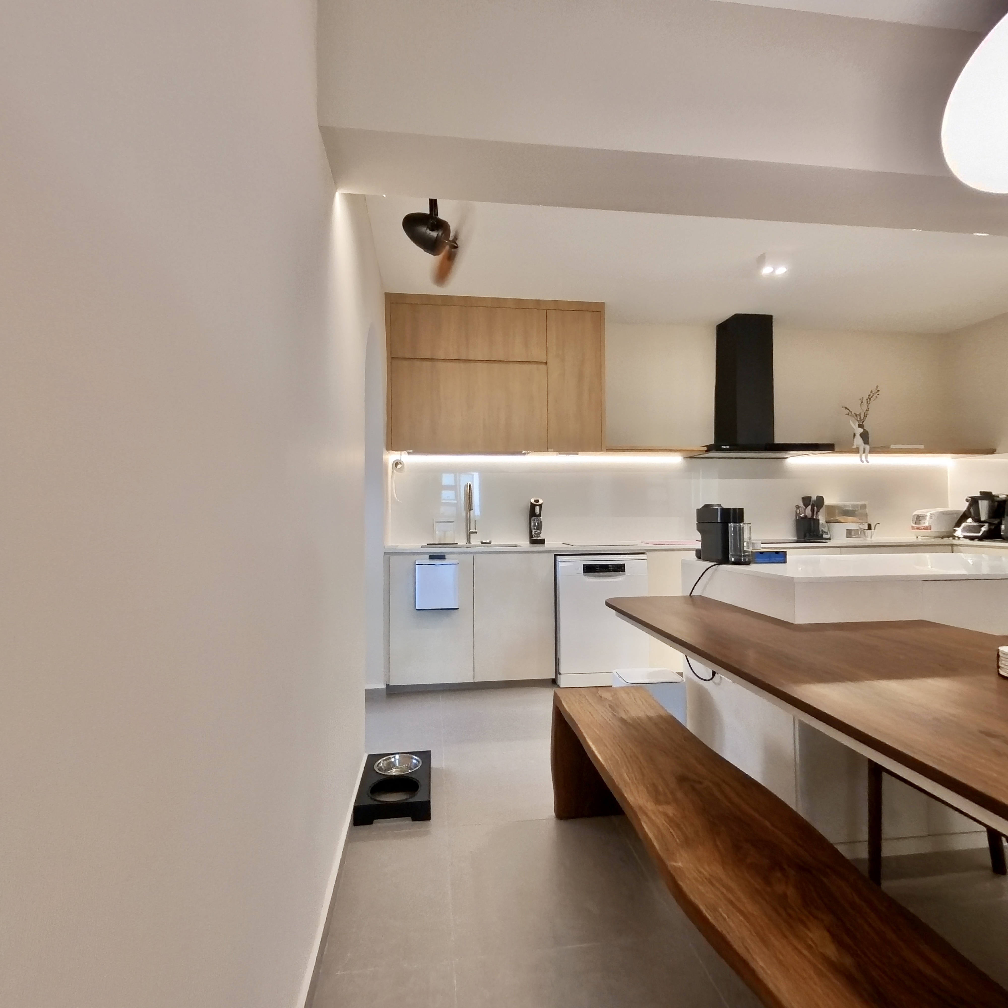 Come take a walk through our minimalist home - Modern kitchen with sleek design, minimalist decor, wooden cabinets, white