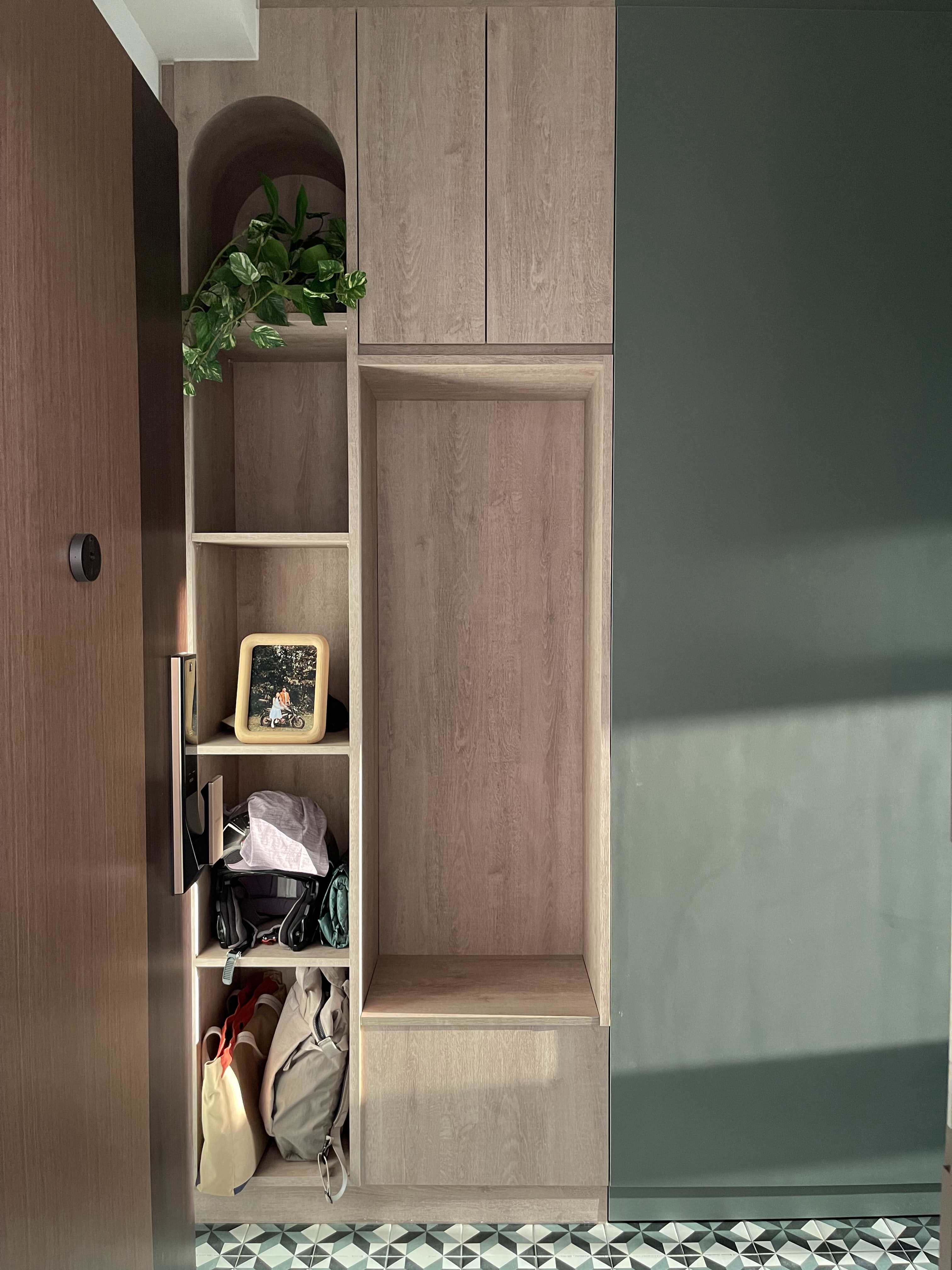 Trunks and Trees Inspired Home - Wooden wardrobe with open shelves, minimalist design, empty shelves, decorative plant