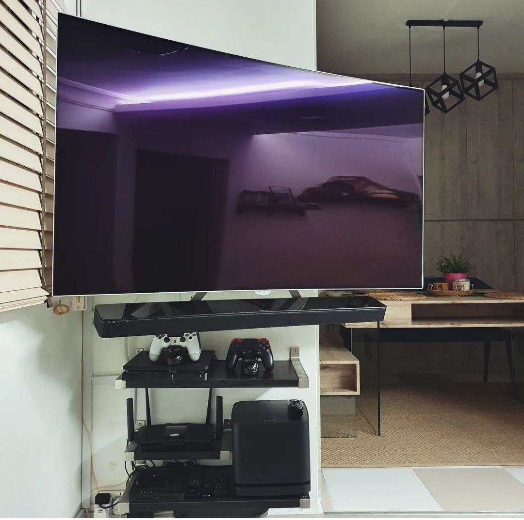 Minimal Cozy Living room - Large flat-screen TV, modern living room, entertainment center, gaming setup, black entertainment