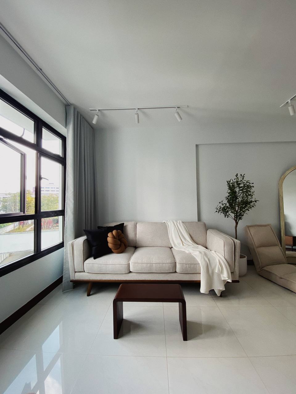 Mid-Century Minimalism: Our Cosy Versatile Living Space - Modern minimalist living room, large window with natural light