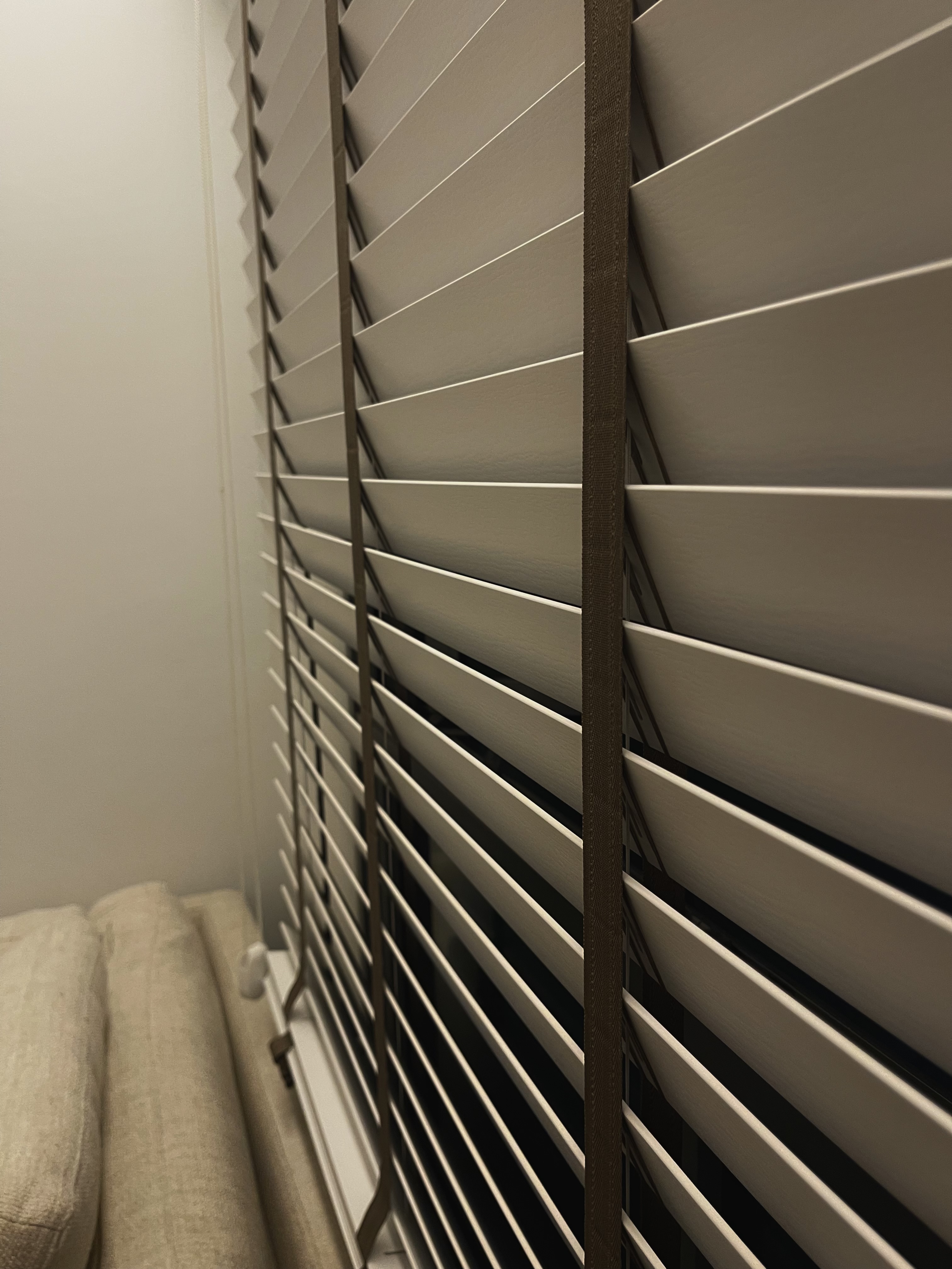 Perfecting our living room for soccer, movies & concert nights - Window blinds, horizontal slats, beige cushions, indoor