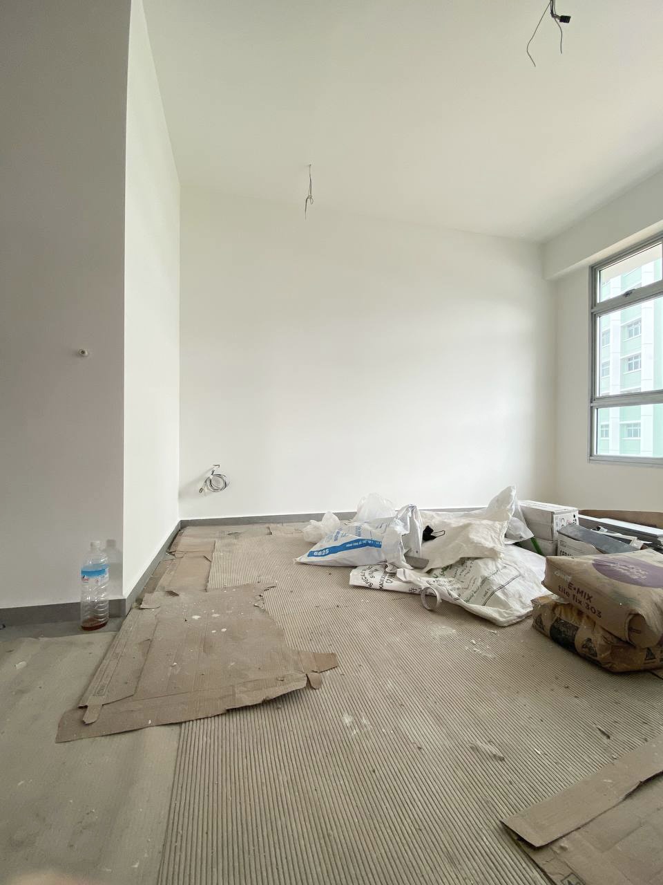 Self-designed living room without a single built-in!  - Empty room with unfinished flooring and scattered construction