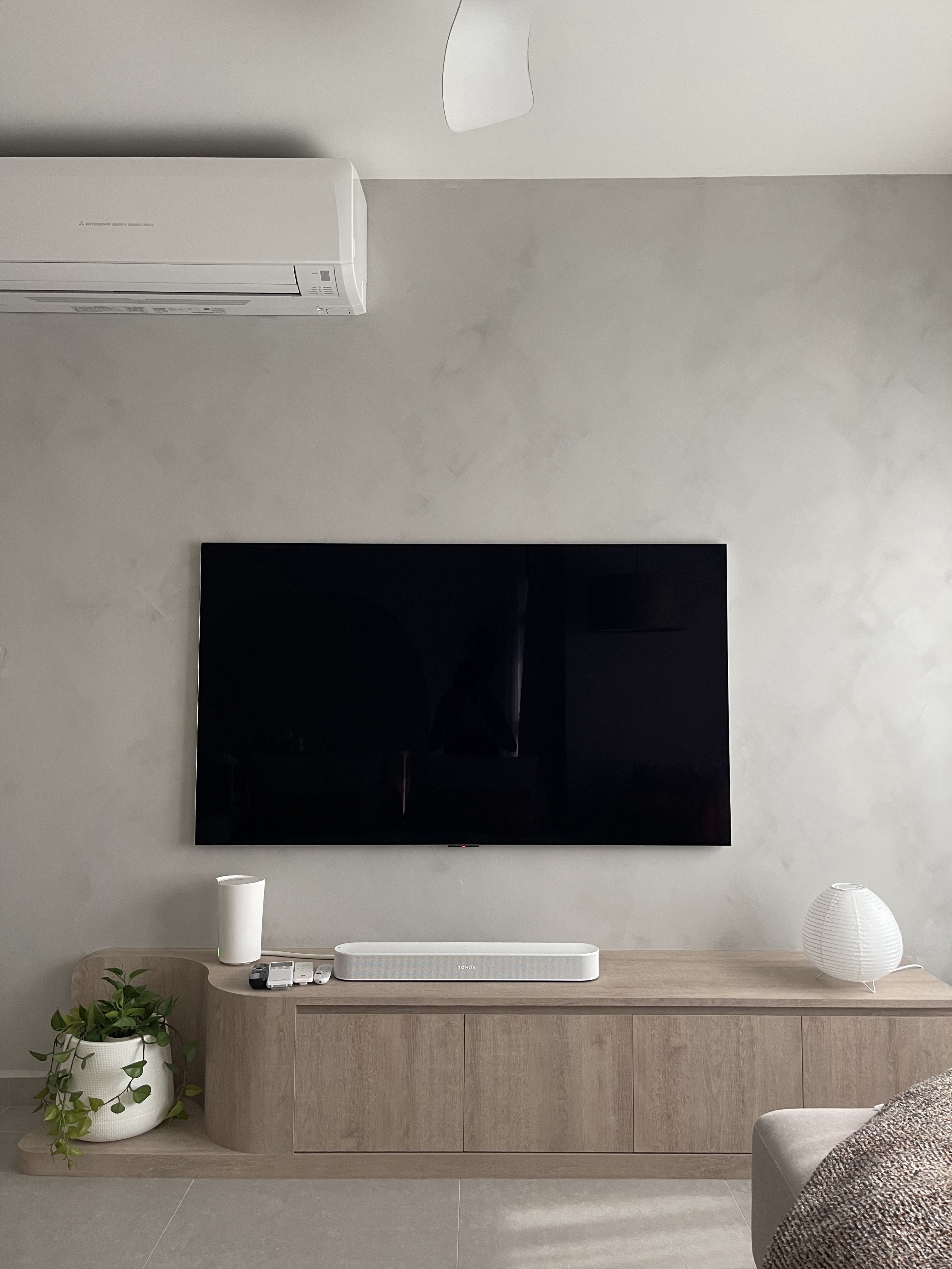 A Living Room with TLC: Textures, Lighting and Colours  - Modern minimalist living room, sleek entertainment center