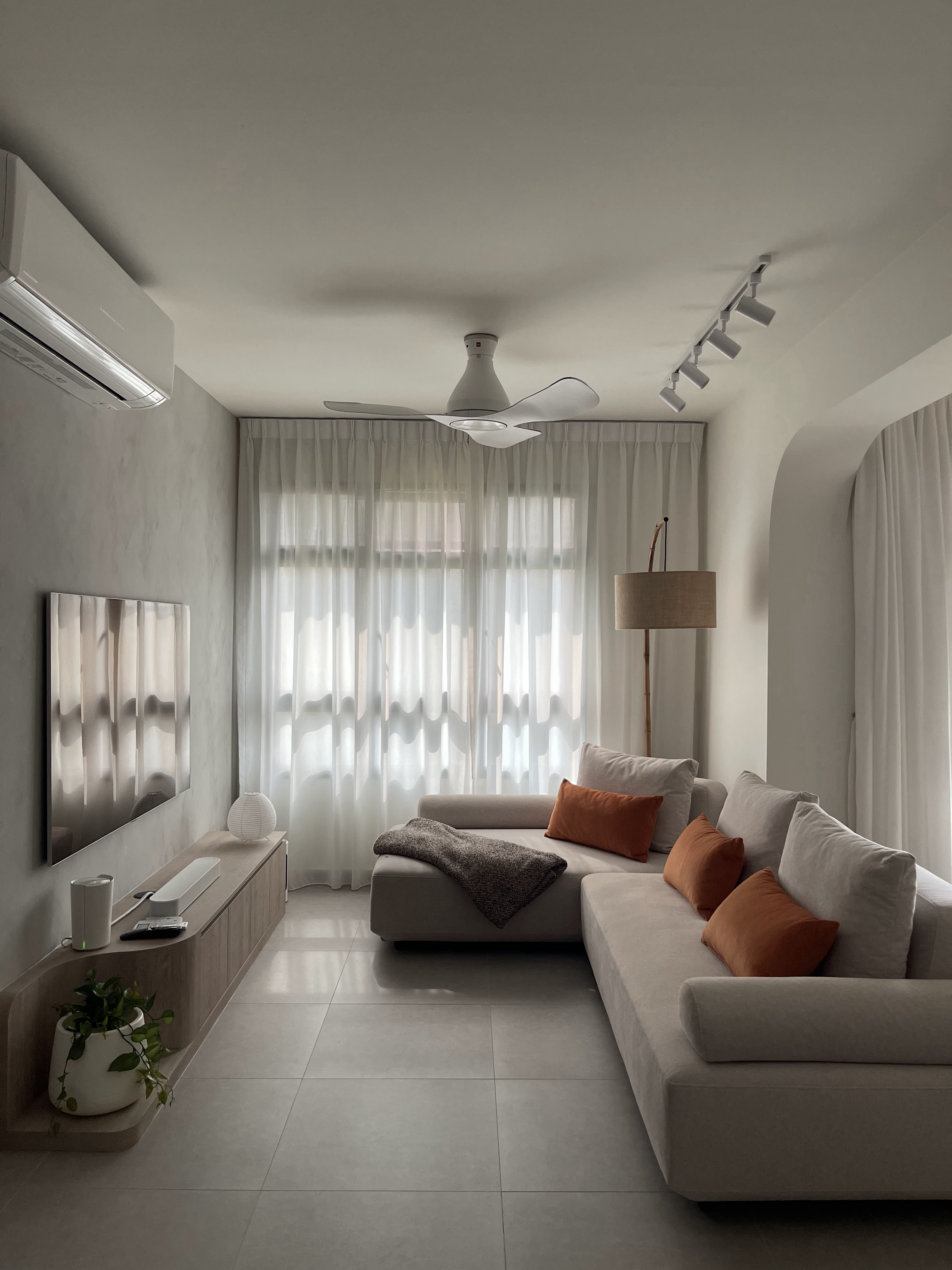 A Living Room with TLC: Textures, Lighting and Colours  - Modern living room with sleek design, minimalist decor, large