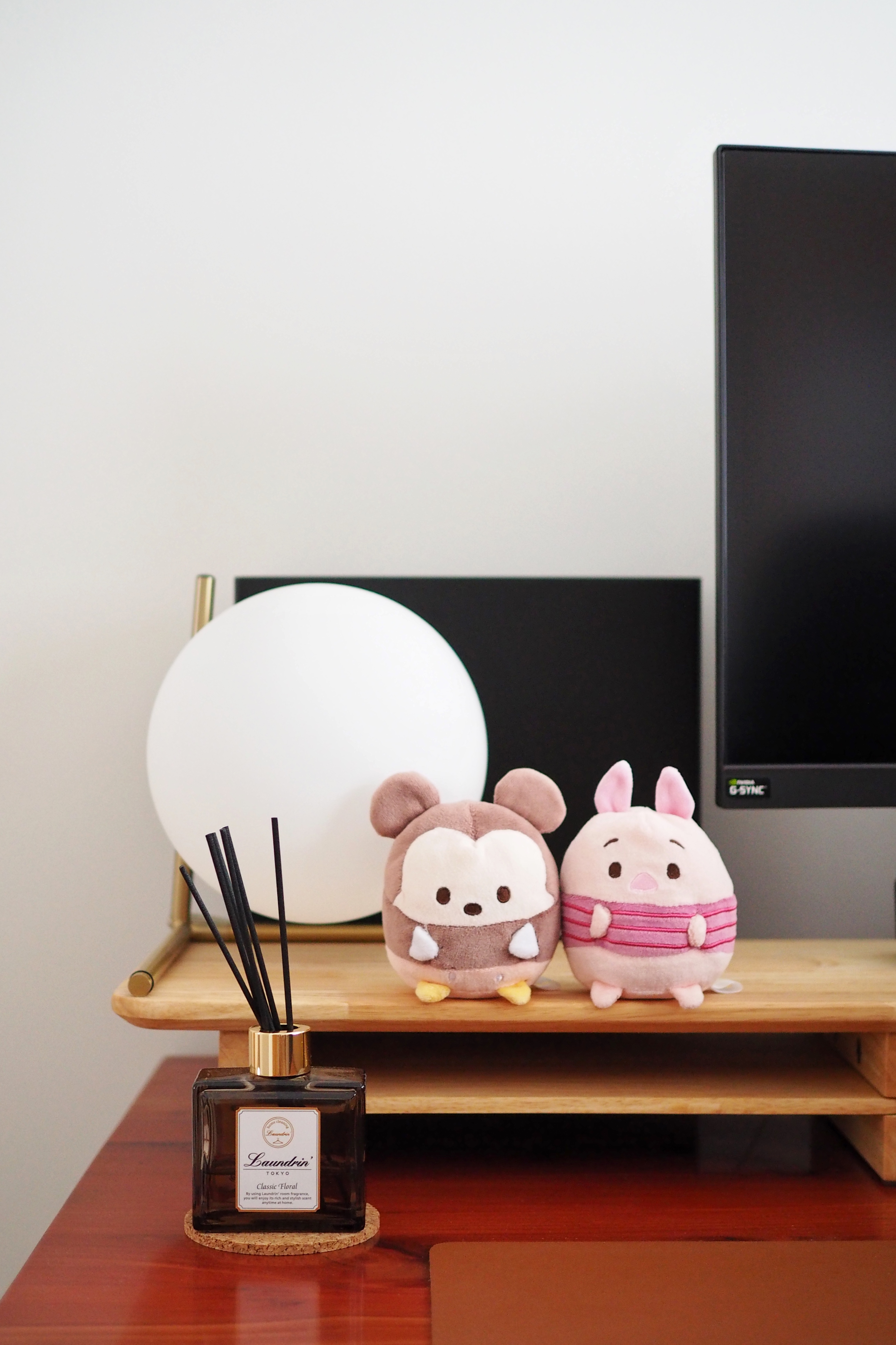 Optimising space: Where aesthetics meets functionality - Soft, plush, toy, animal, sitting, on, wooden shelf, black and white