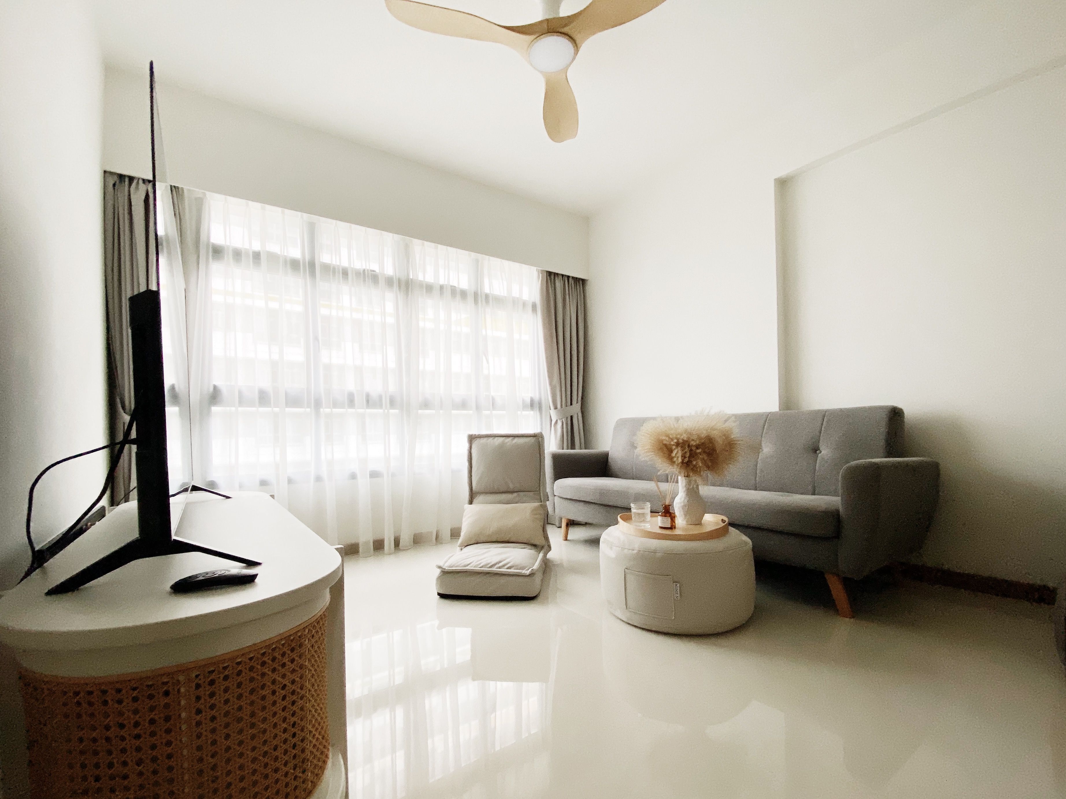 Style + Comfort In This Multi-Functional Living Room - Modern living room, minimalist design, bright room, large windows