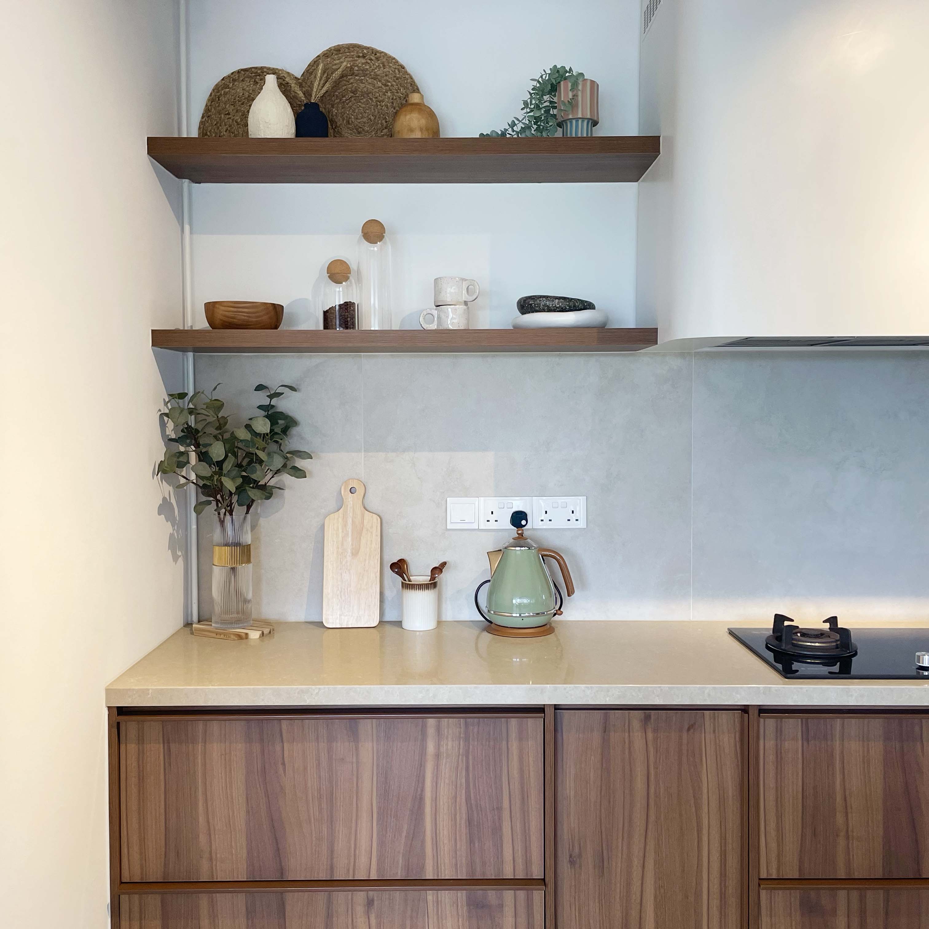 Housewarming - Japandi-inspired home - Shelf with decorative items, kitchen countertop, wooden cabinets, light beige