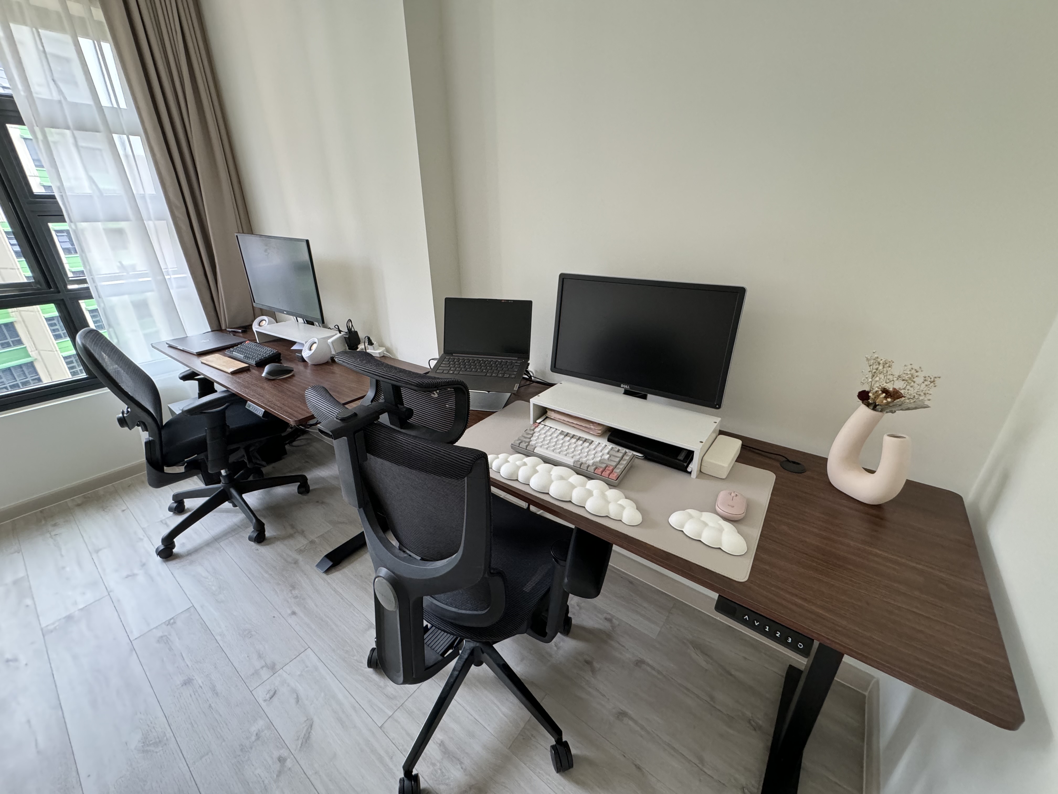 Buttercream Wabi Sabi Abode - Modern workspace, minimalist design, ergonomic chair, desk with dual monitors, keyboard and