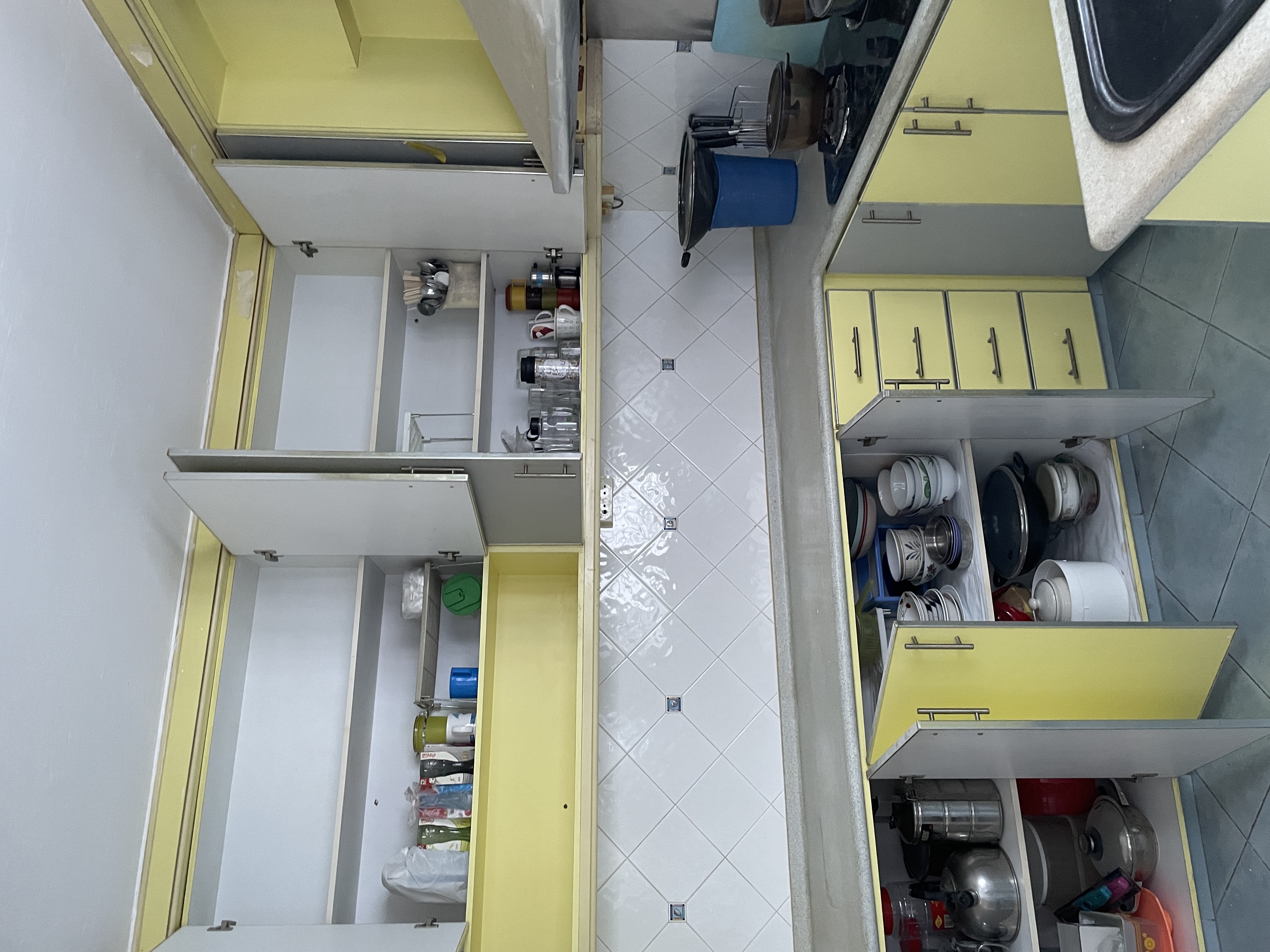 House-Hunting: Seeking a Spacious Home for our Growing Family Of Four  - yellow kitchen cabinets, open shelves, kitchen