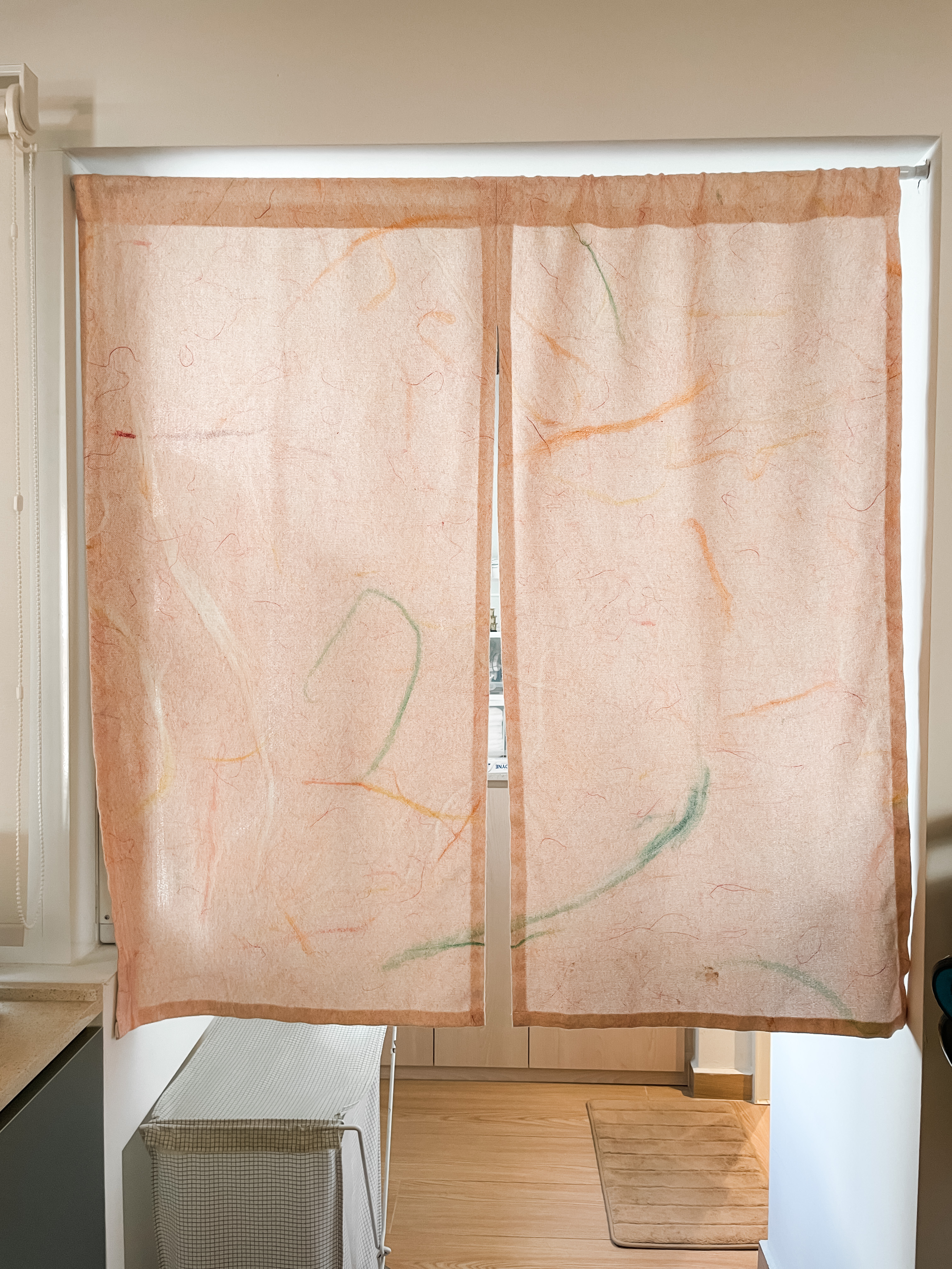 House-Hunting: Seeking a Spacious Home for our Growing Family Of Four  - Soft, peach-colored curtains with subtle abstract