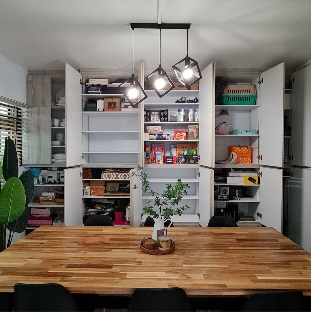 Multi-Functional Dining Room - Wooden dining table, minimalist design, open shelves, modern decor, indoor garden, indoor
