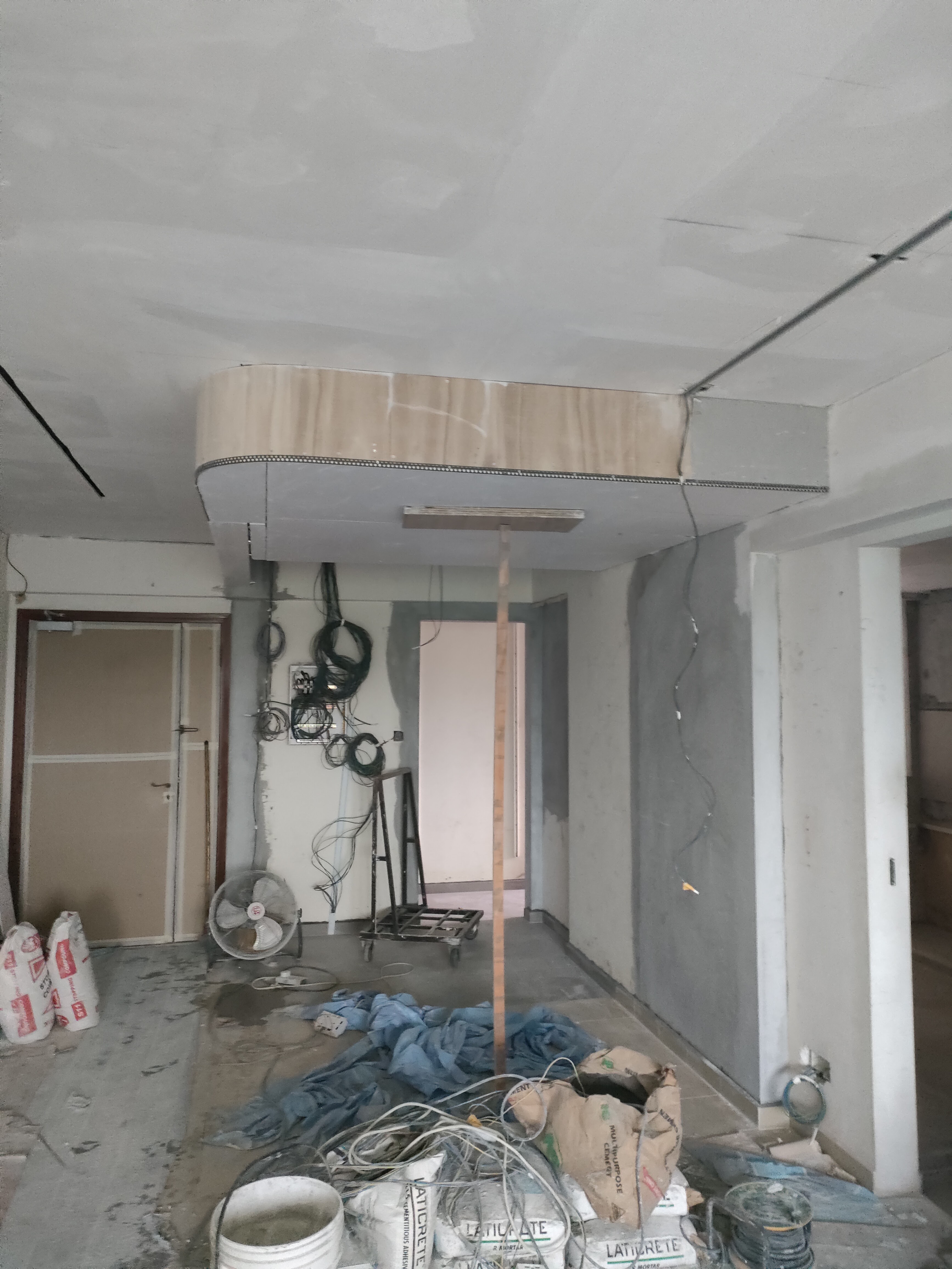 We had no dining area so we created one! - Construction site with unfinished ceiling and exposed wiring, Various construction