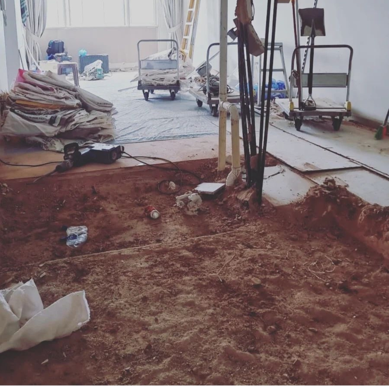 We had no dining area so we created one! - Construction site with exposed foundation and loose soil, Scattered construction