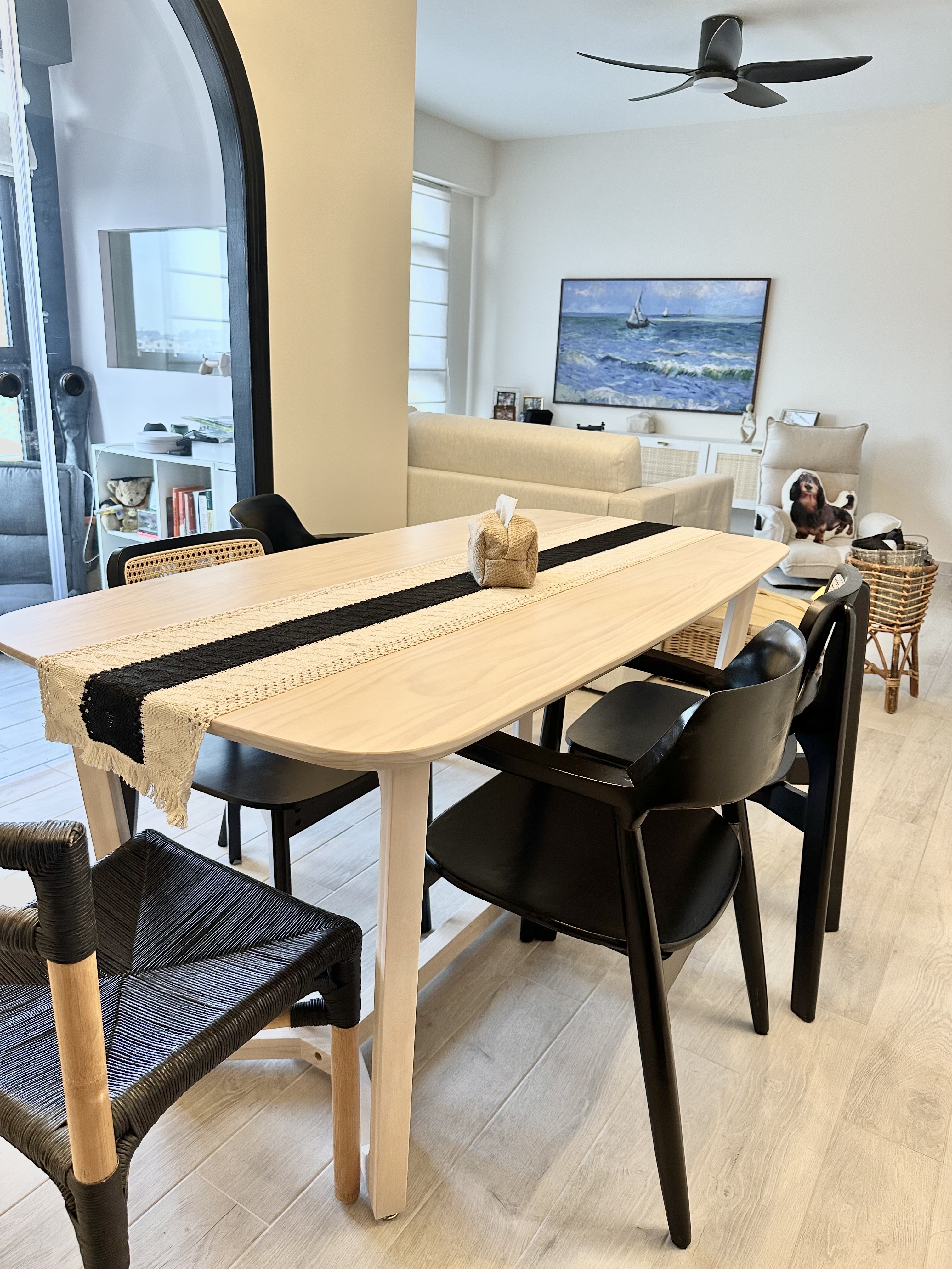 Making space for our dining area!  - modern dining room, minimalist design, wooden dining table, black chairs, woven chair