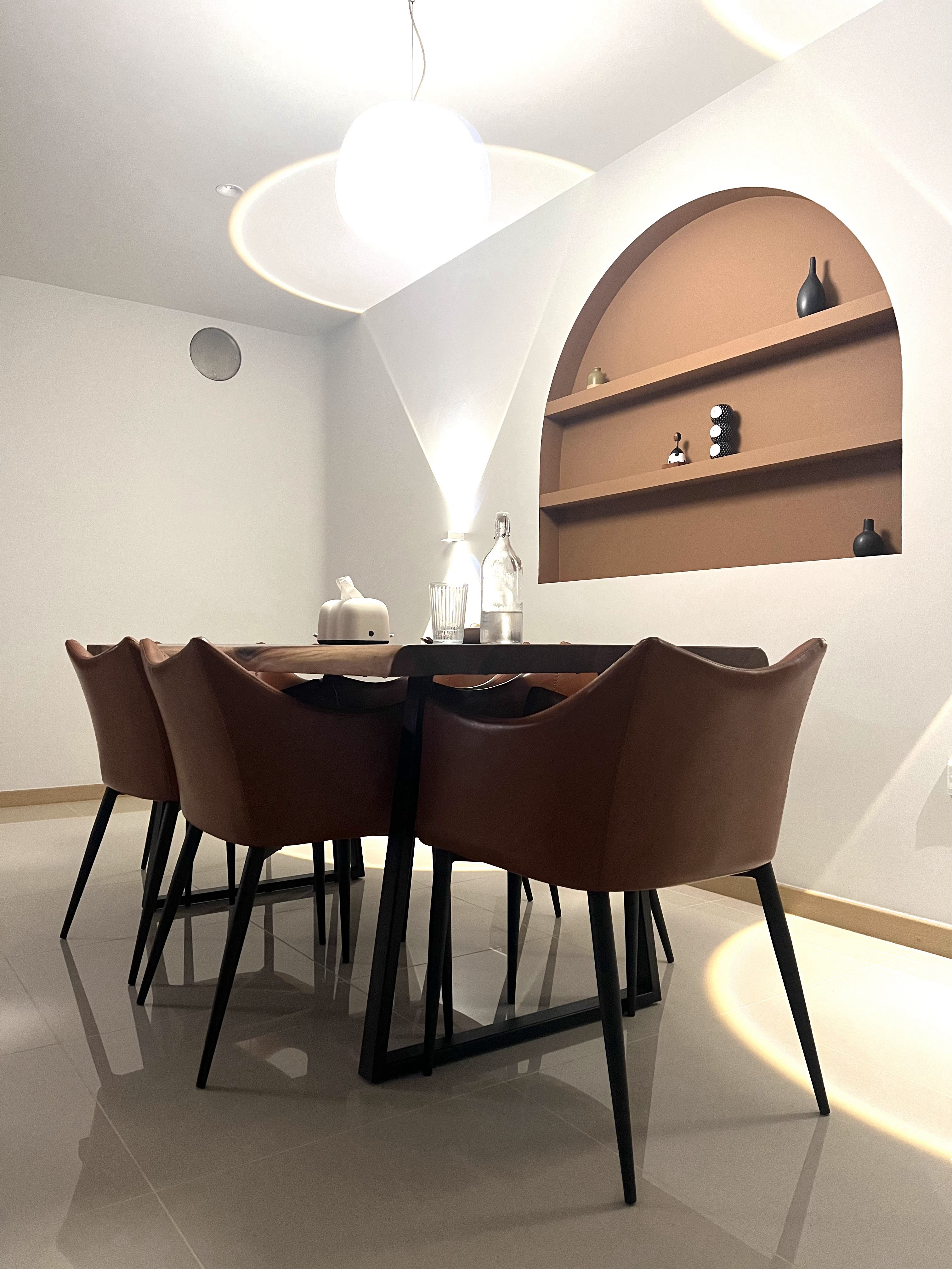 A Seat at Our Table: Discovering Our Dining Space - Modern dining room, minimalist design, sleek furniture, brown leather