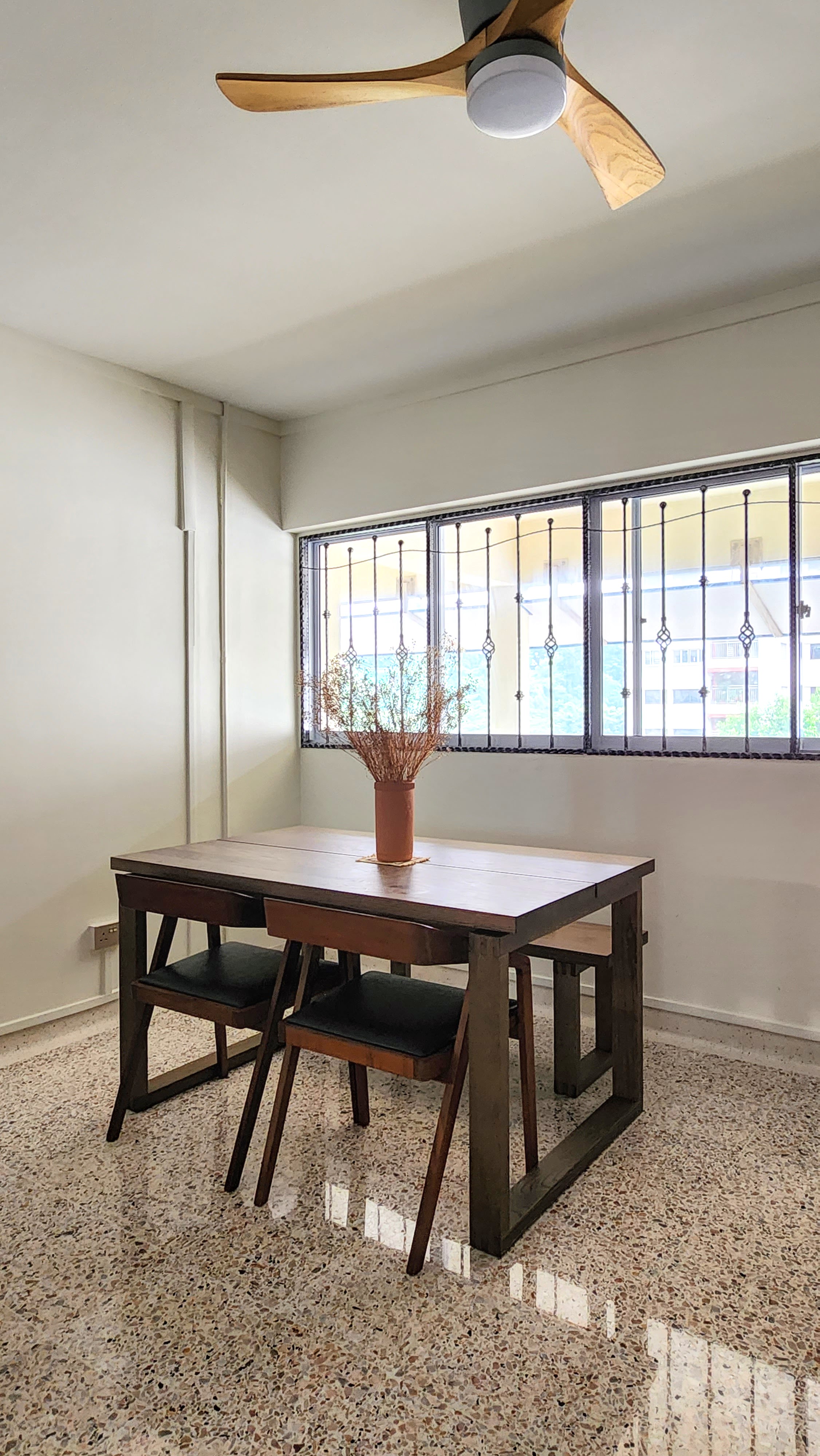 Living: injecting personal touches to a blank canvas - more to come! - Wooden dining table with black chairs