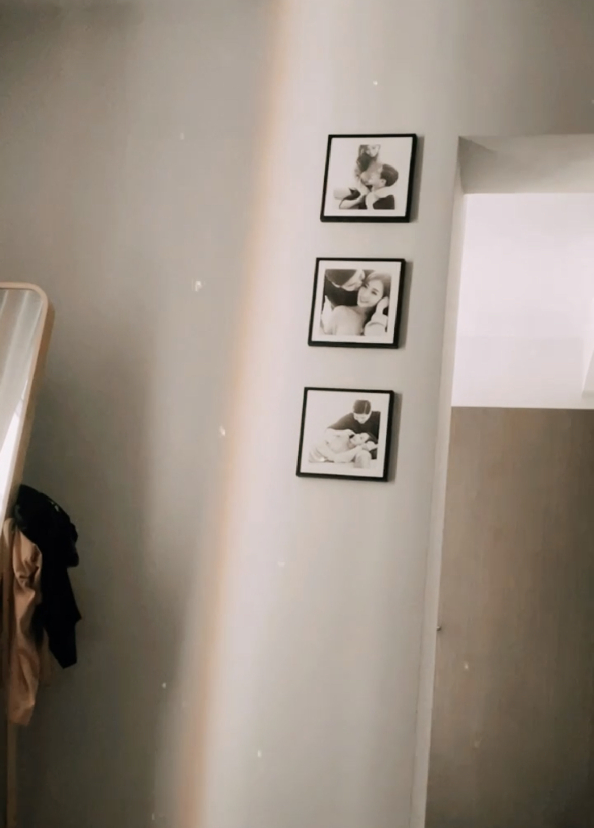 A place to rest and recharge  - Wall, framed pictures, black and white, family, intimate, cozy, serene, soft lighting