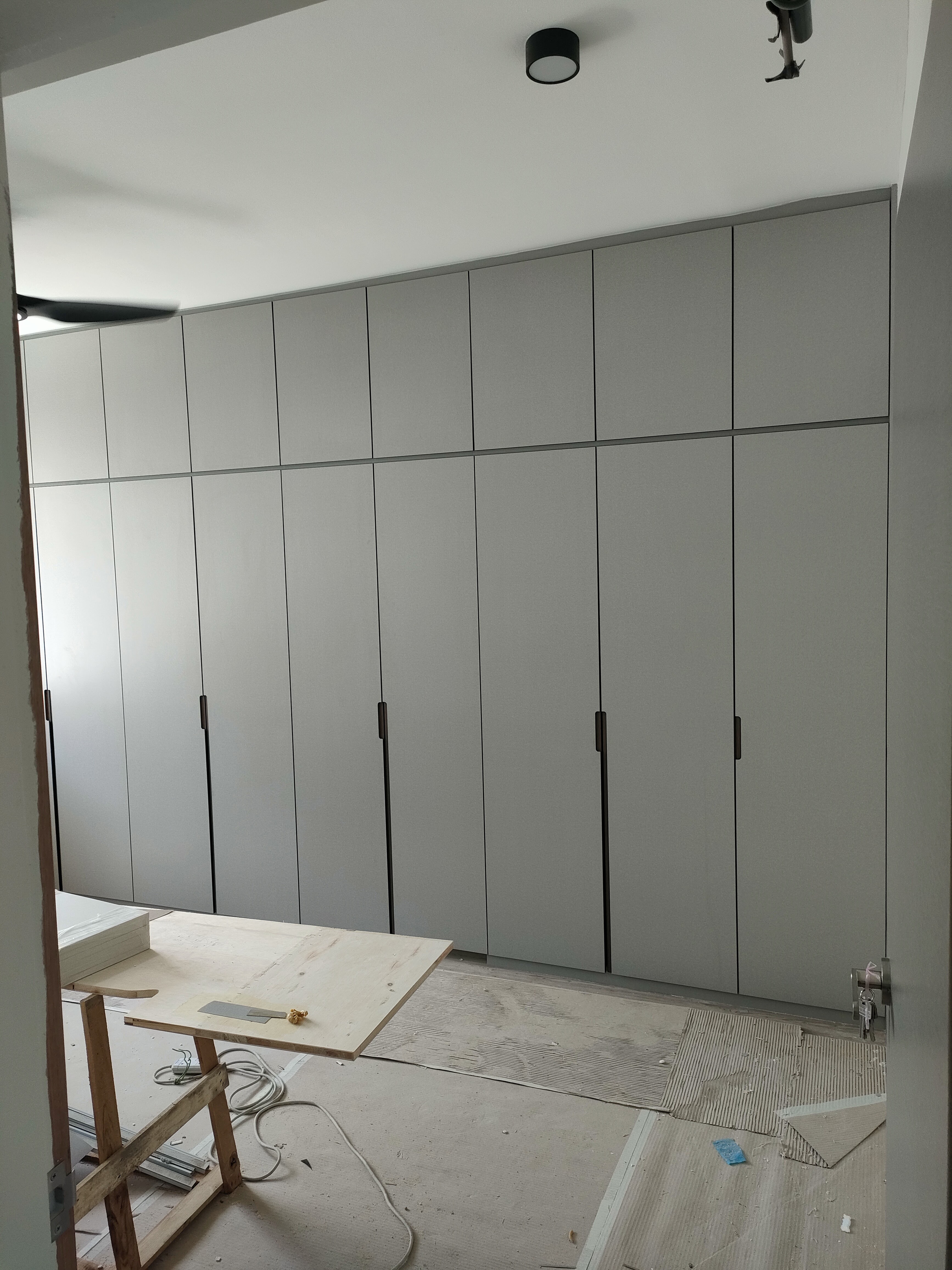 Masterbedroom.. Our sanctuary after a hard's day of work - Gray cabinetry, modern design, large closet, wooden floor