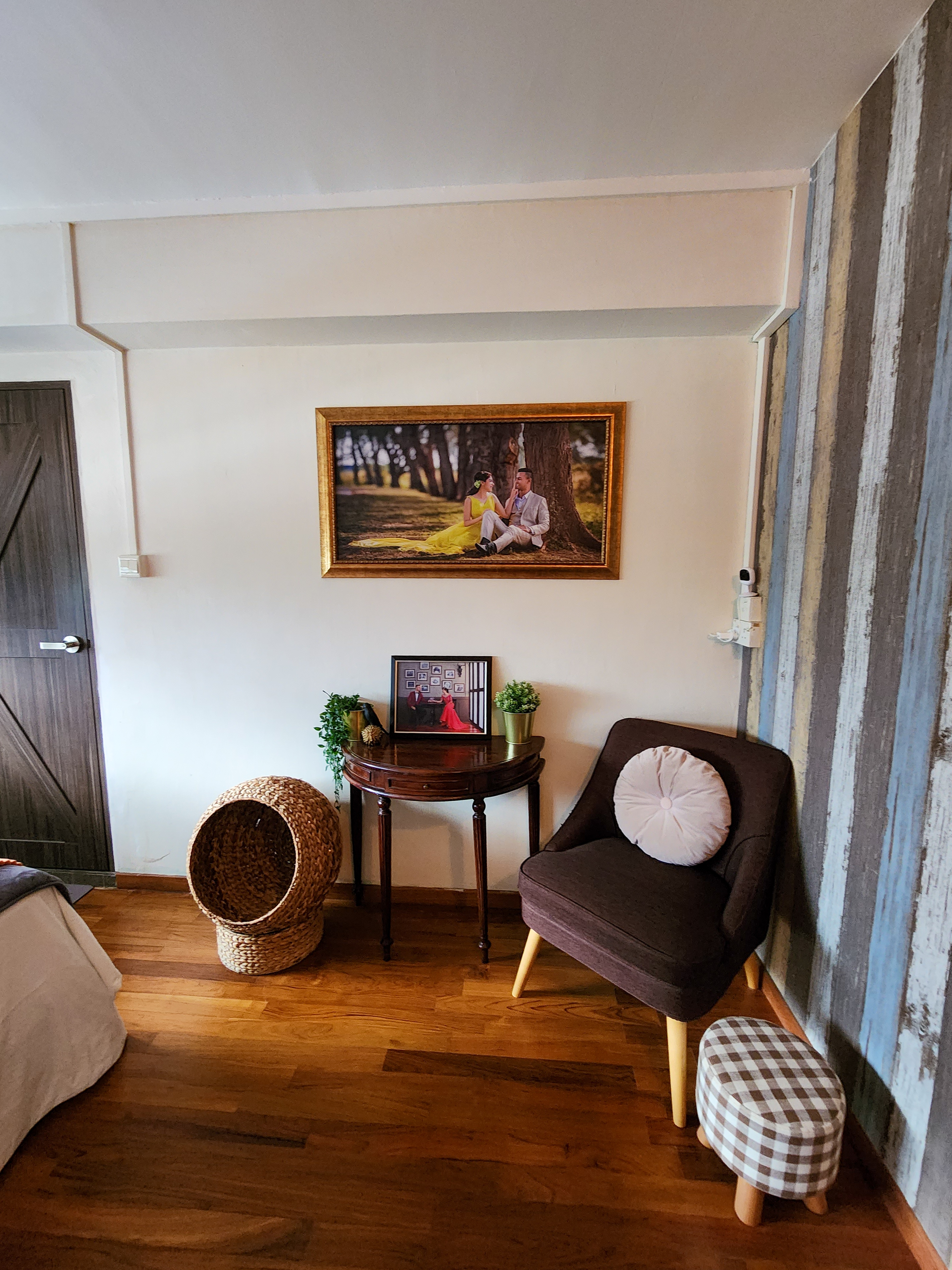 Cosy Escapade - Wooden floor, cozy room, rustic decor, striped wallpaper, wooden door, woven basket, brown upholstered chair