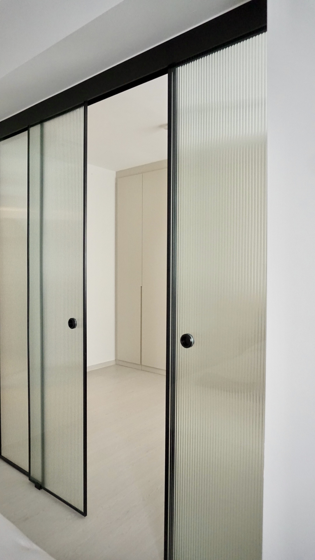 Our-bedroom;-the-room-behind-the-reeded-glass-doors