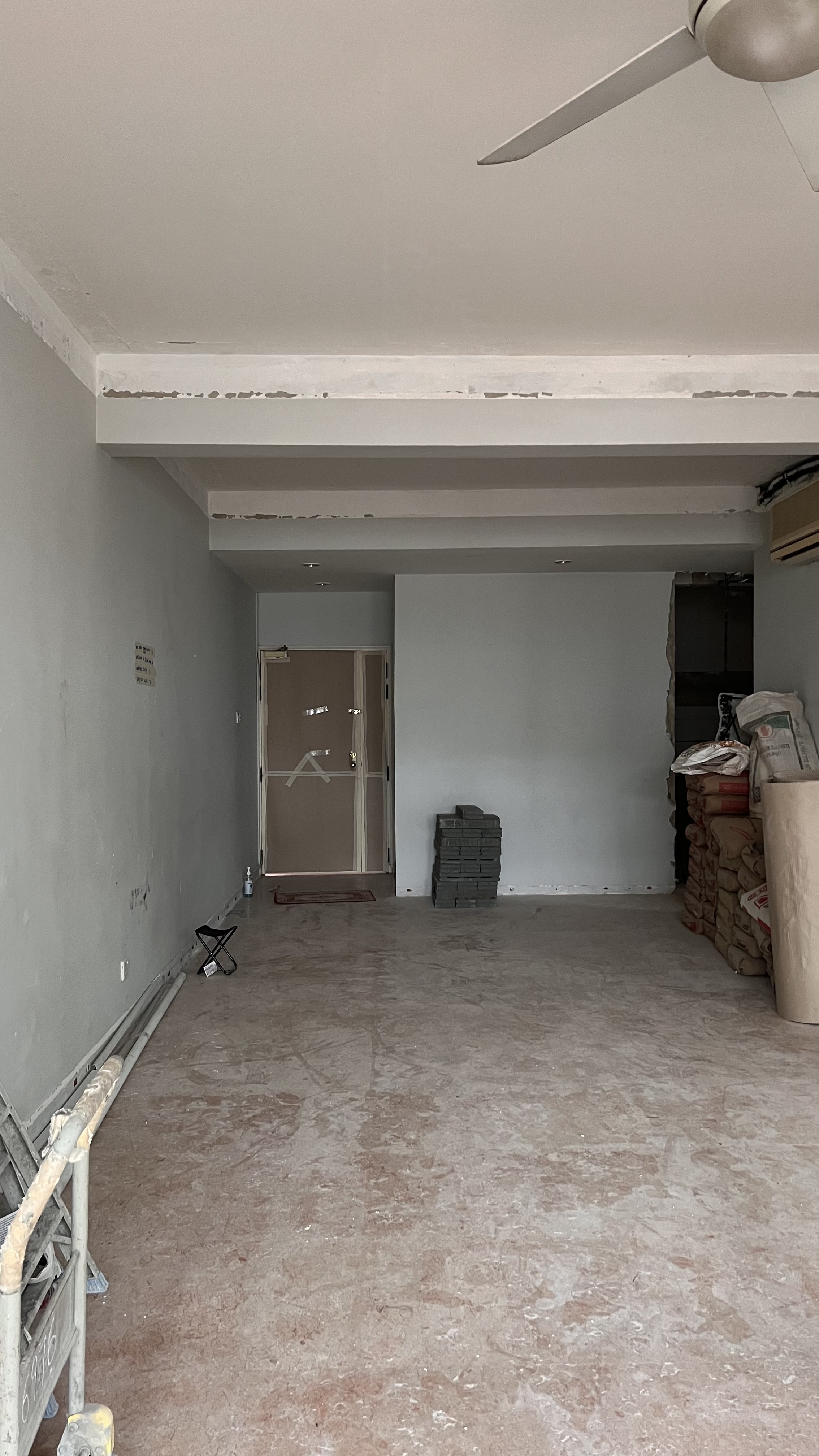 Mid Century Modern Dining Room - Empty room with unfinished ceiling and exposed beams, Construction site with bare concrete