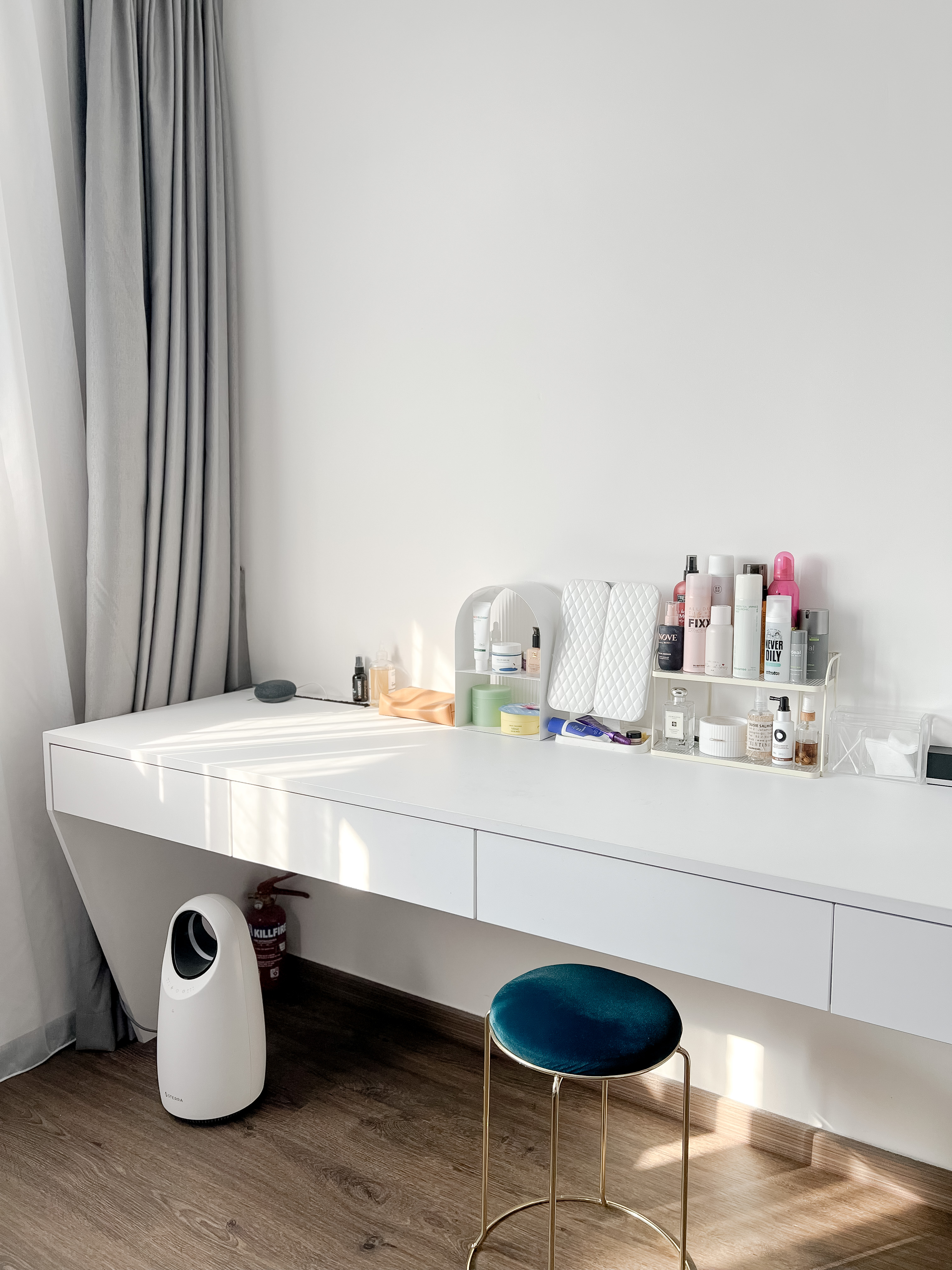 Cozy Bedroom - Nestled in comfort and warmth, where dreams take flight - White vanity with neatly arranged cosmetics