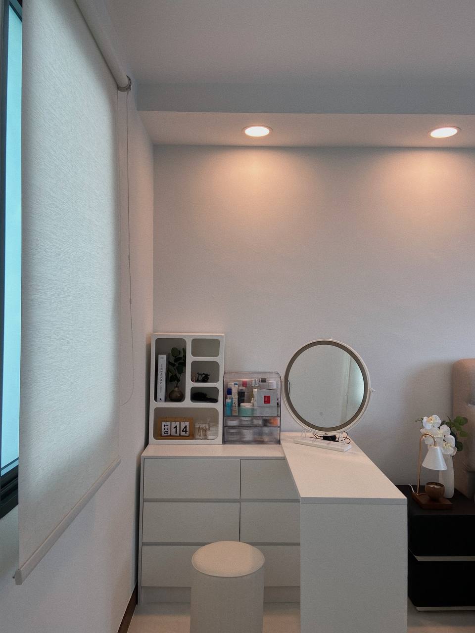 Peaceful Nights, Beautiful Mornings: Our Master Bedroom Haven - White vanity with built-in storage, round mirror on white