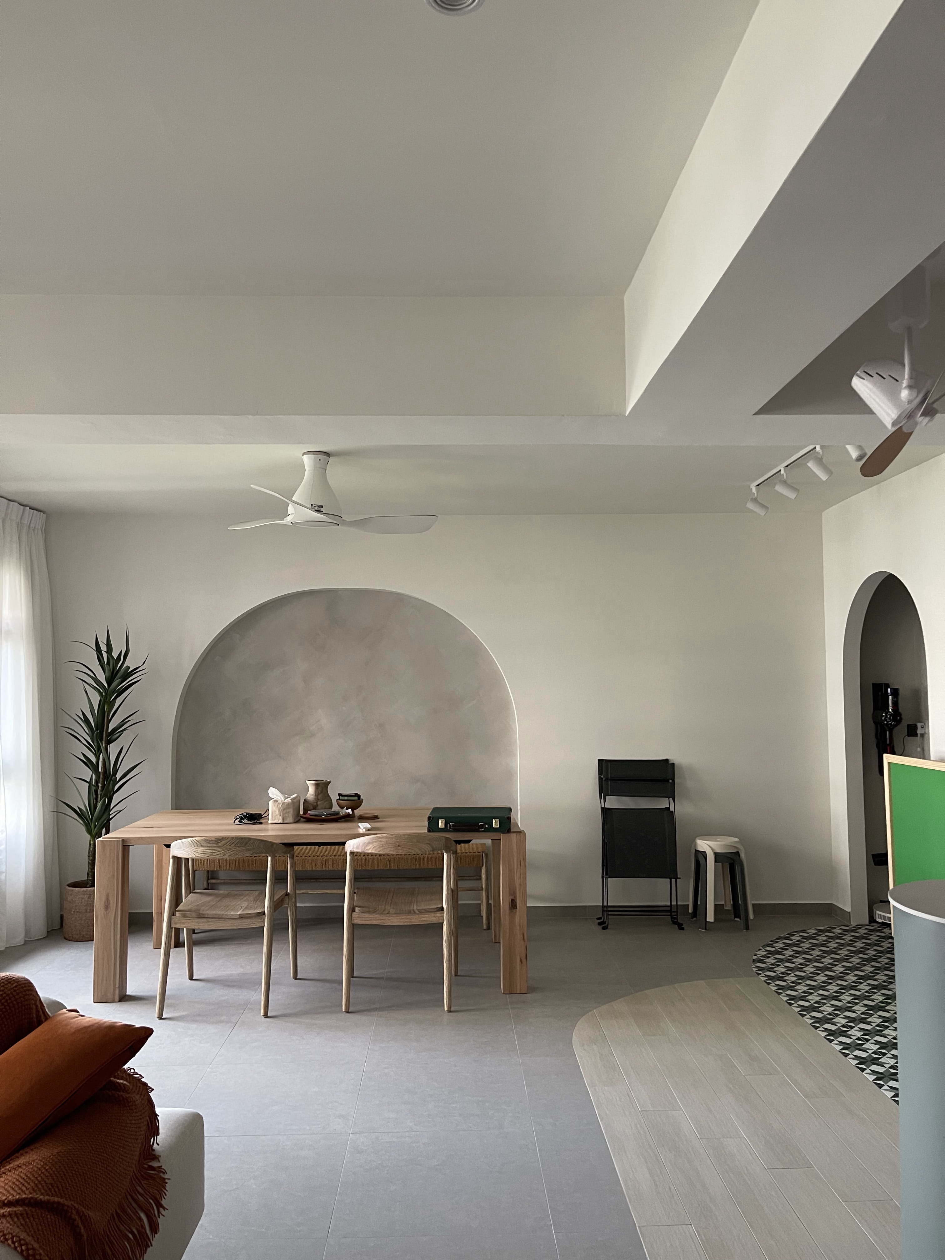 The Dining Area: The Heart of Our Home  - Modern minimalist dining room, neutral color palette, large arched recessed wall