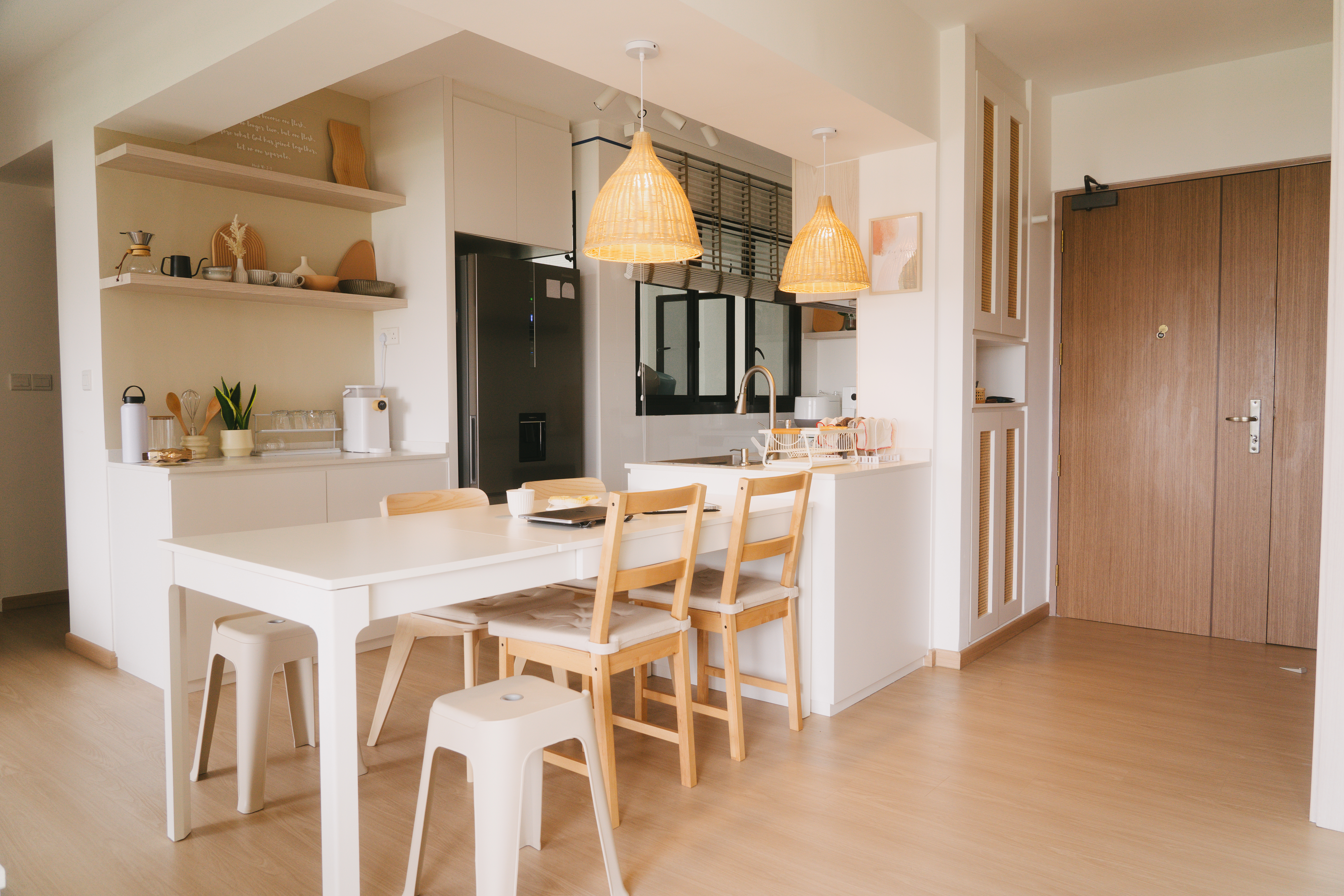 A place where food and conversations meet – Dining area - Modern kitchen with white cabinetry, wooden dining table and