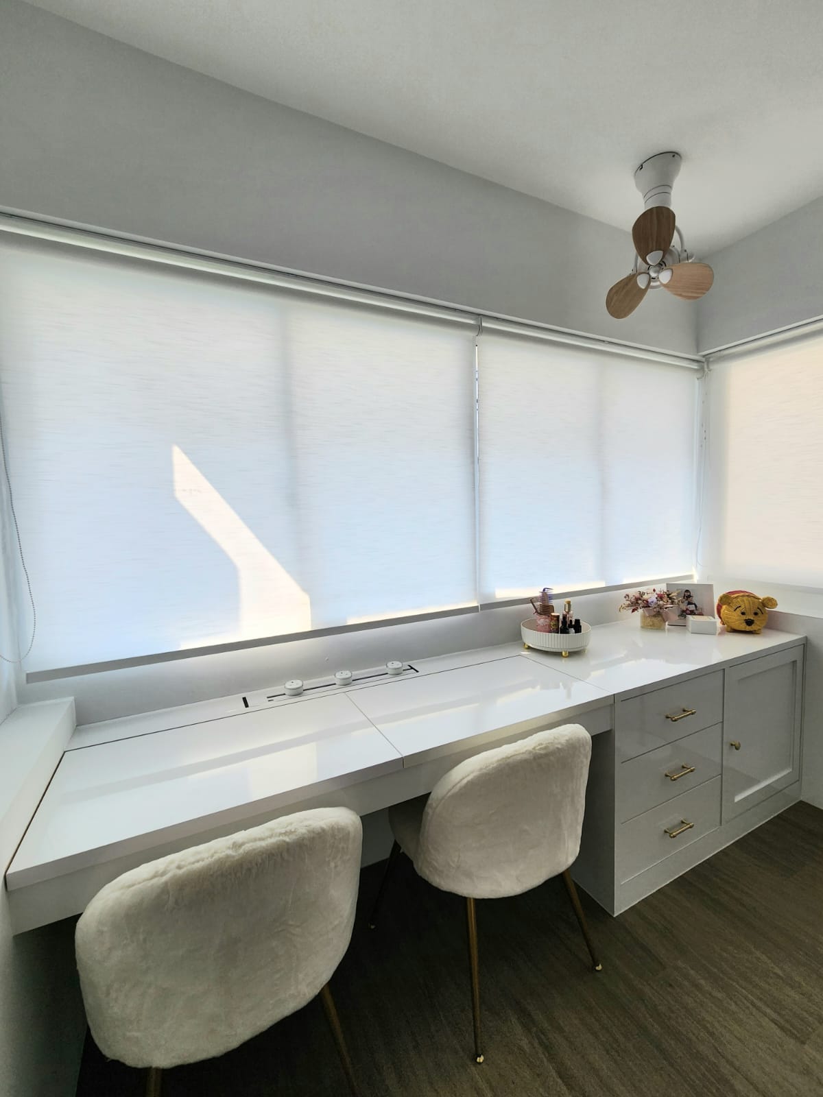 A bedroom with walk-in wardrobe  - White vanity desk, minimalist design, large window blinds, soft natural light, modern