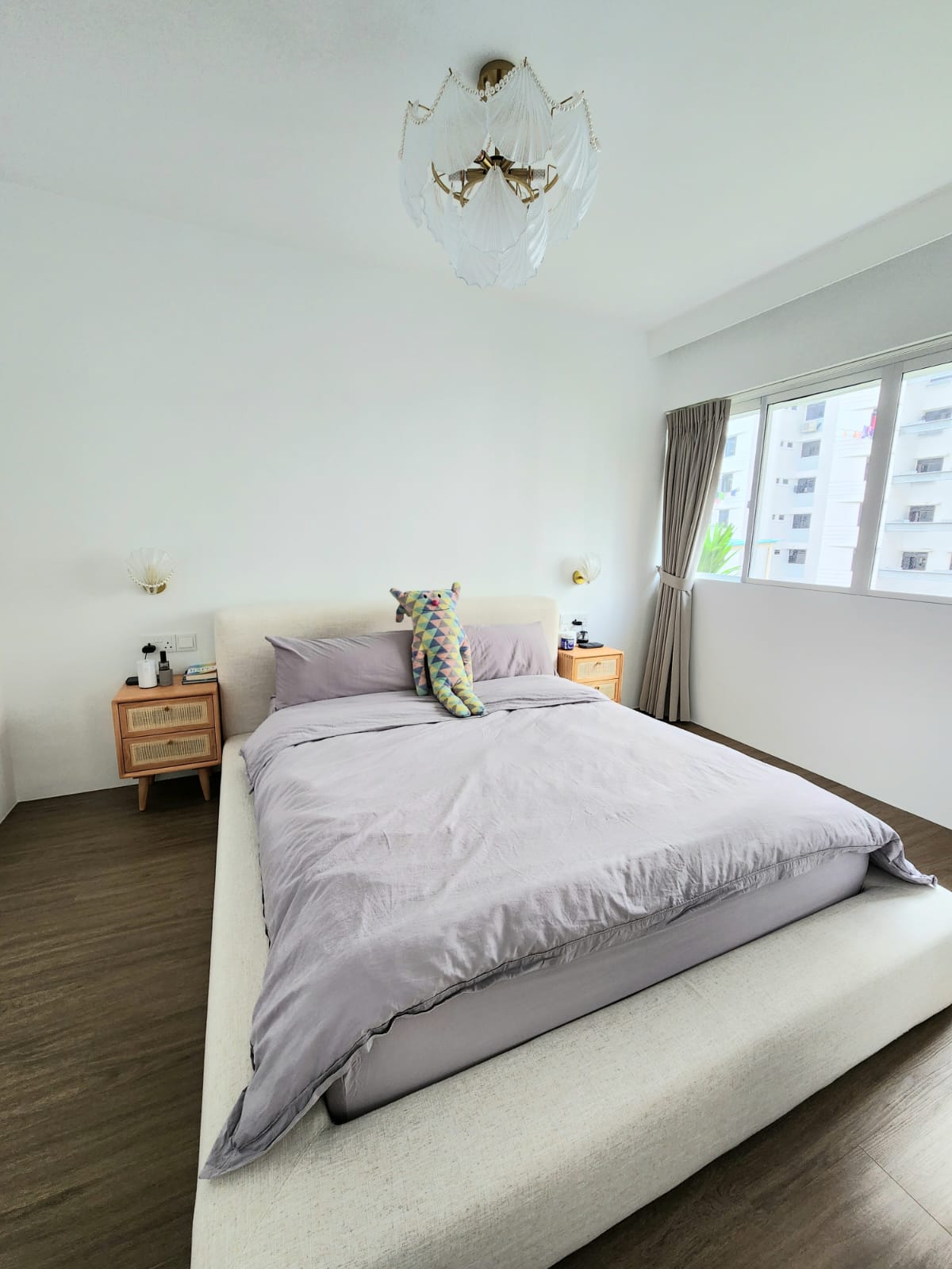 A bedroom with walk-in wardrobe  - Modern minimalist bedroom, cozy bed with gray bedding, soft natural light, white walls