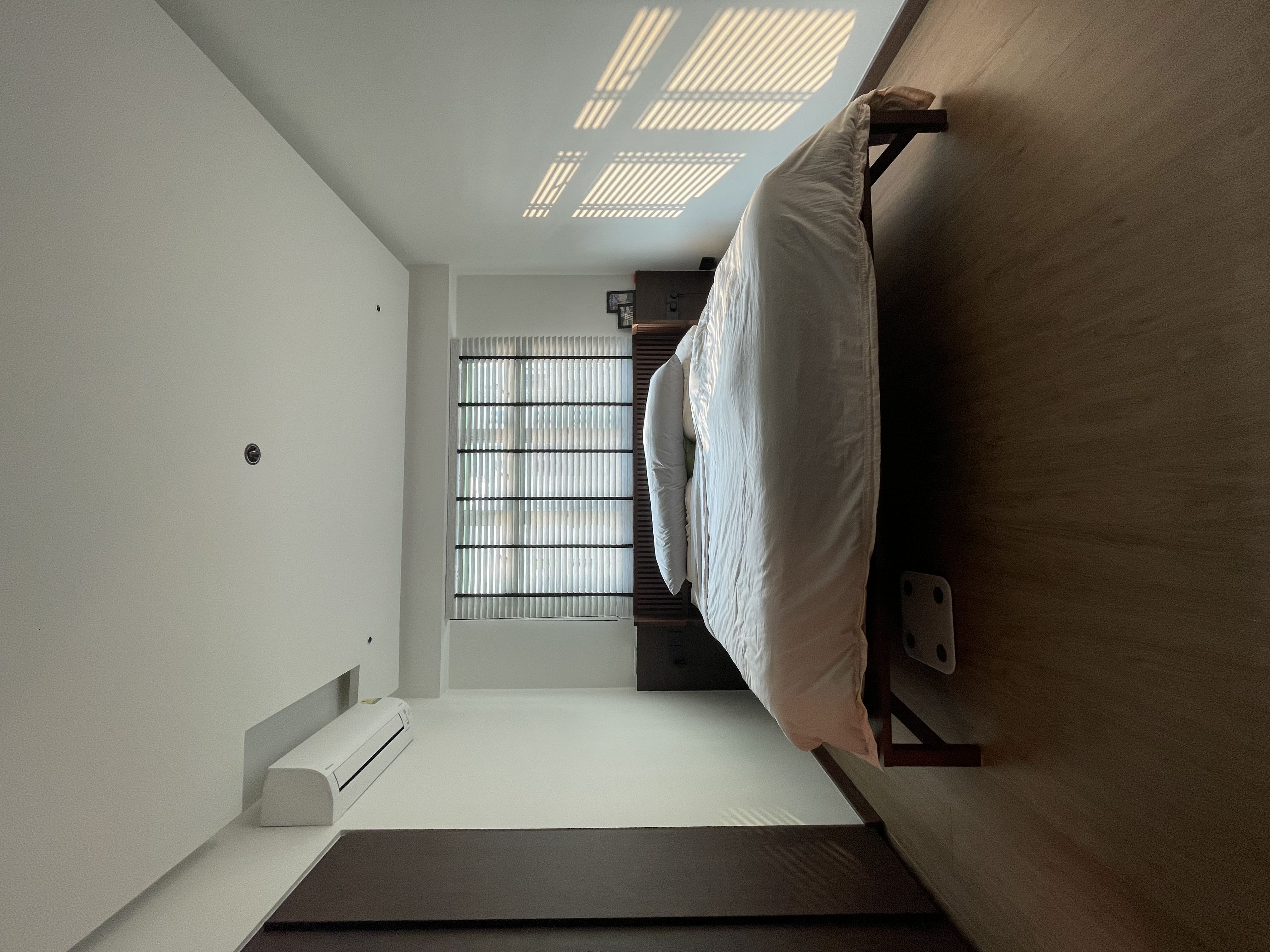 Day / Night : Our Master Bedroom - Minimalist bedroom with modern design, large bed with white bedding, wooden nightstand